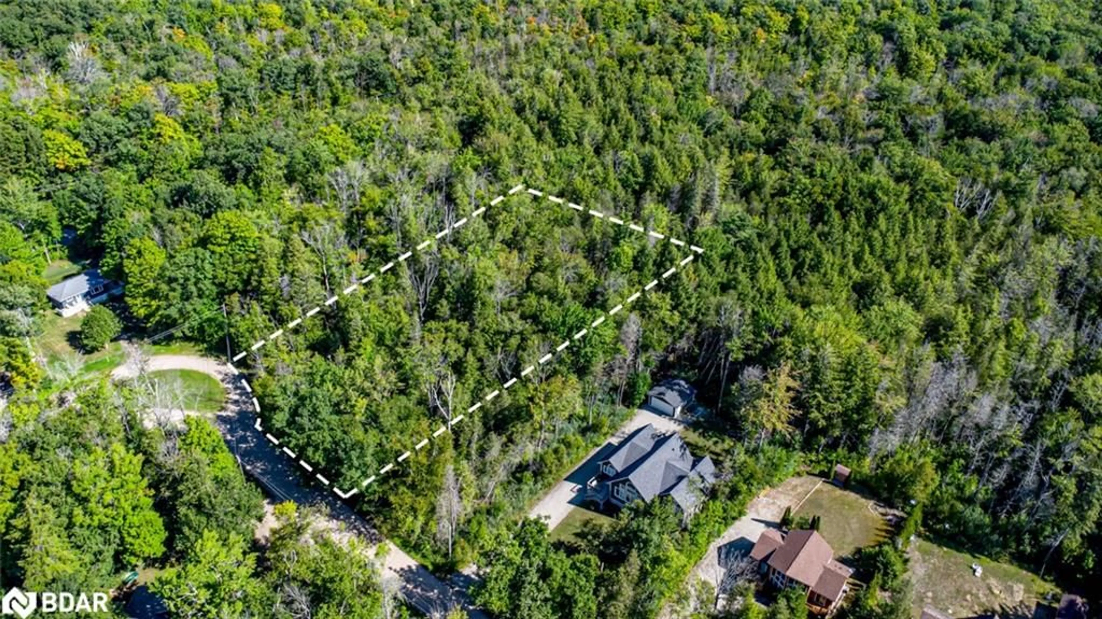 A pic from outside/outdoor area/front of a property/back of a property/a pic from drone, forest/trees view for 38 Lasalle Trail, Tiny Ontario L9M 0G3