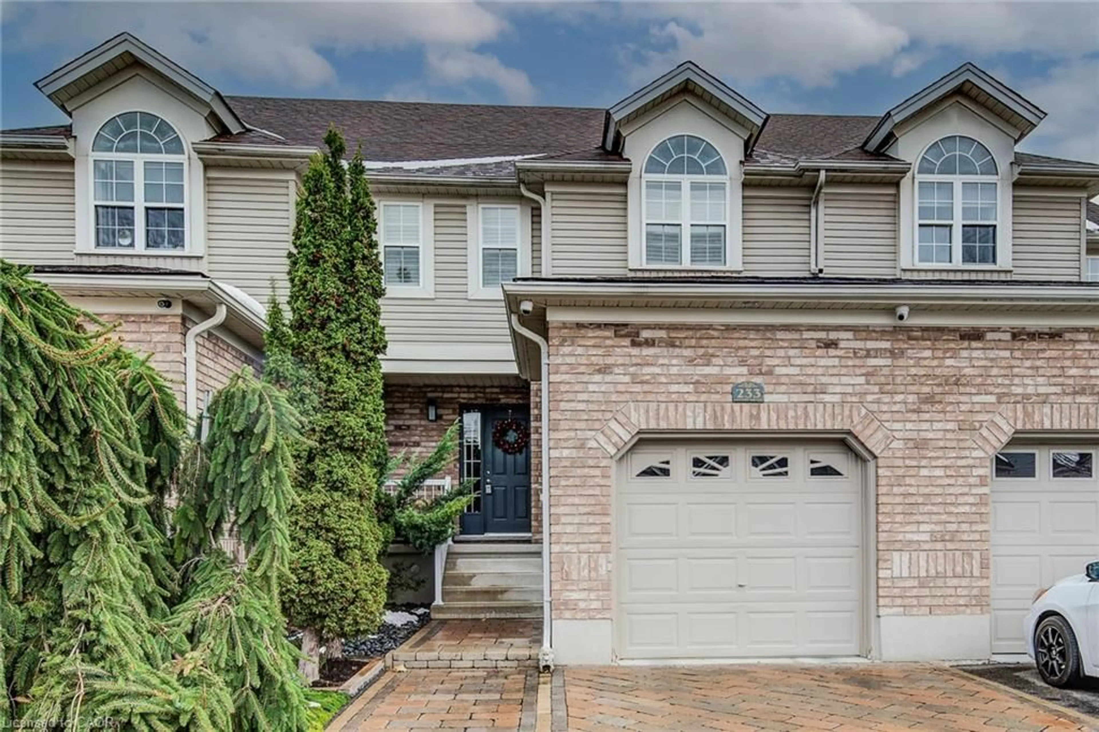 Home with brick exterior material, street for 233 Cotton Grass St, Kitchener Ontario N2E 4A5