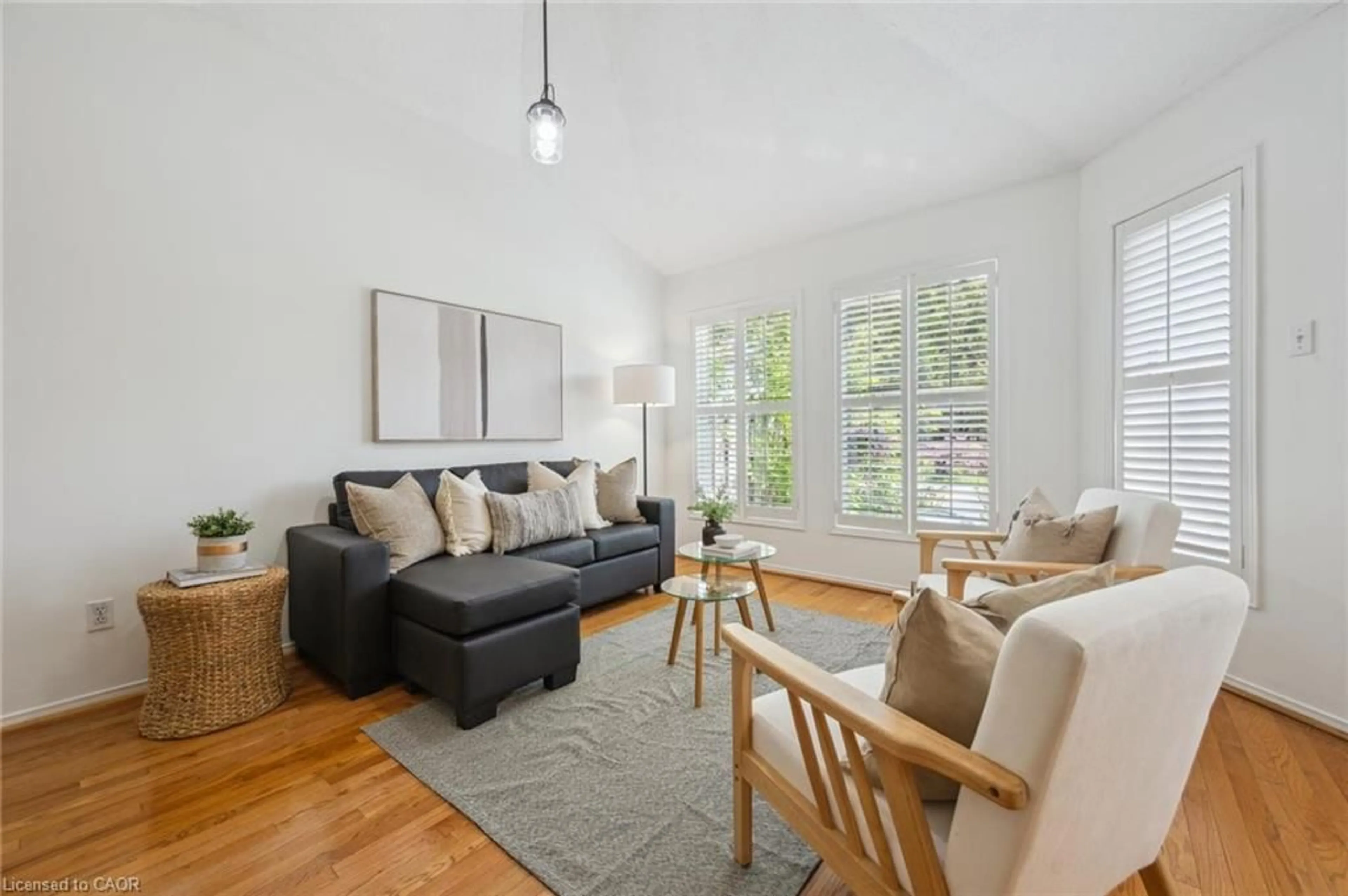 Living room with furniture, wood/laminate floor for 1240 Westview Terr #58, Oakville Ontario L6M 3M3