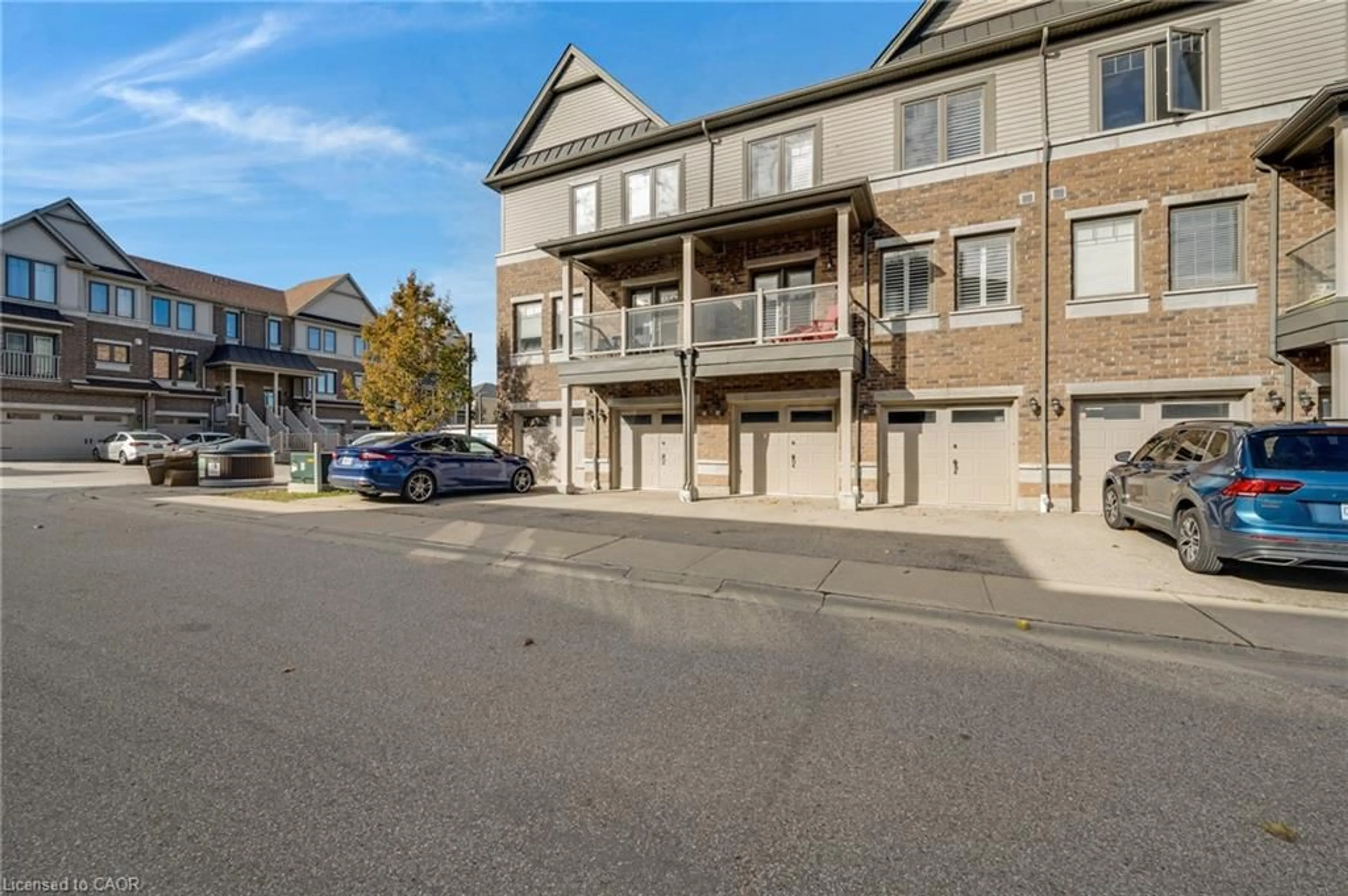 A pic from outside/outdoor area/front of a property/back of a property/a pic from drone, street for 70 Willowrun Dr #E7, Kitchener Ontario N2A 0J3