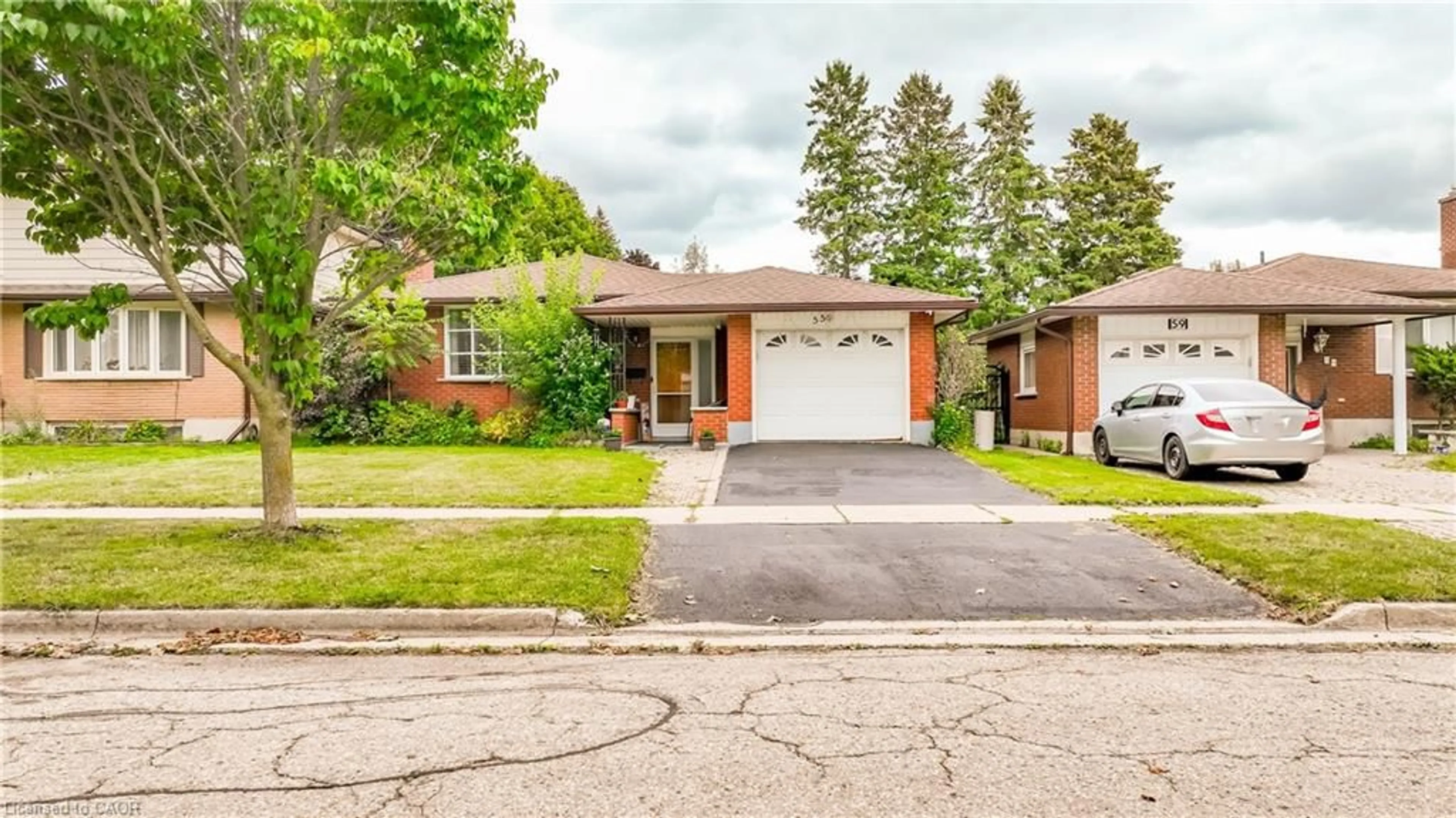 Home with brick exterior material, street for 55 Ramblewood Way, Kitchener Ontario N2N 1G8