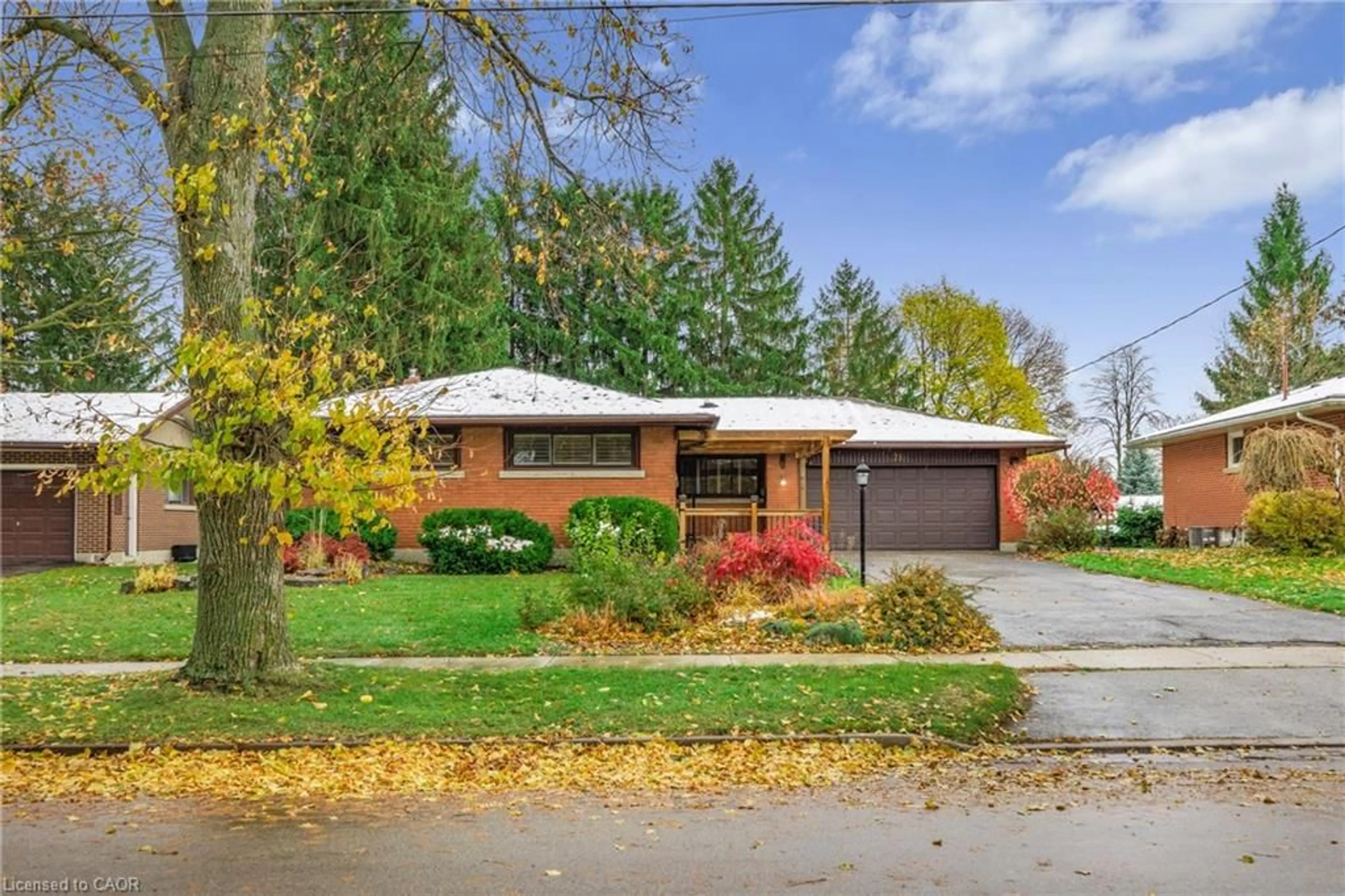 Home with brick exterior material, street for 21 Cyprus Dr, Kitchener Ontario N2M 4R4