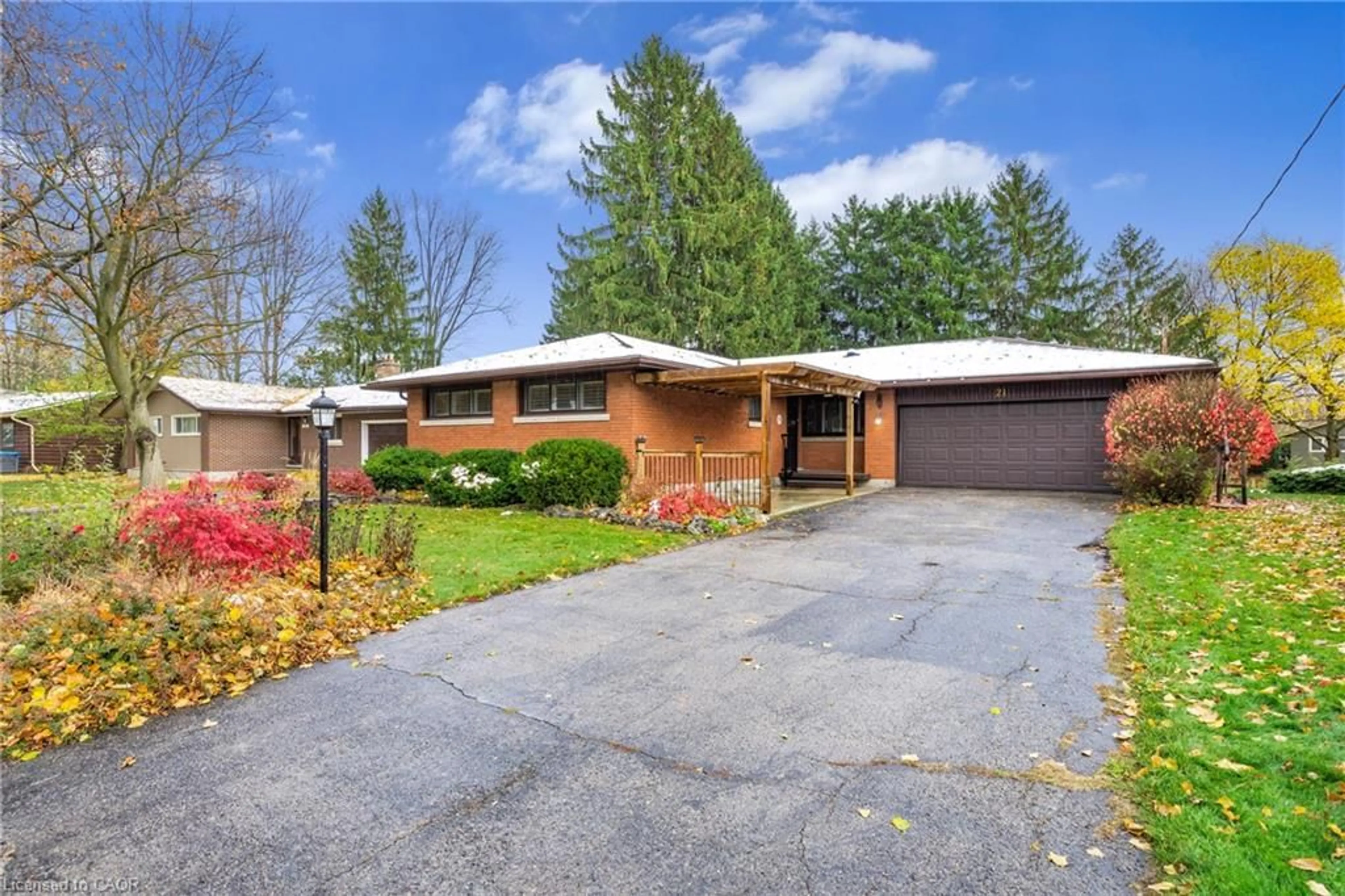 Home with brick exterior material, street for 21 Cyprus Dr, Kitchener Ontario N2M 4R4