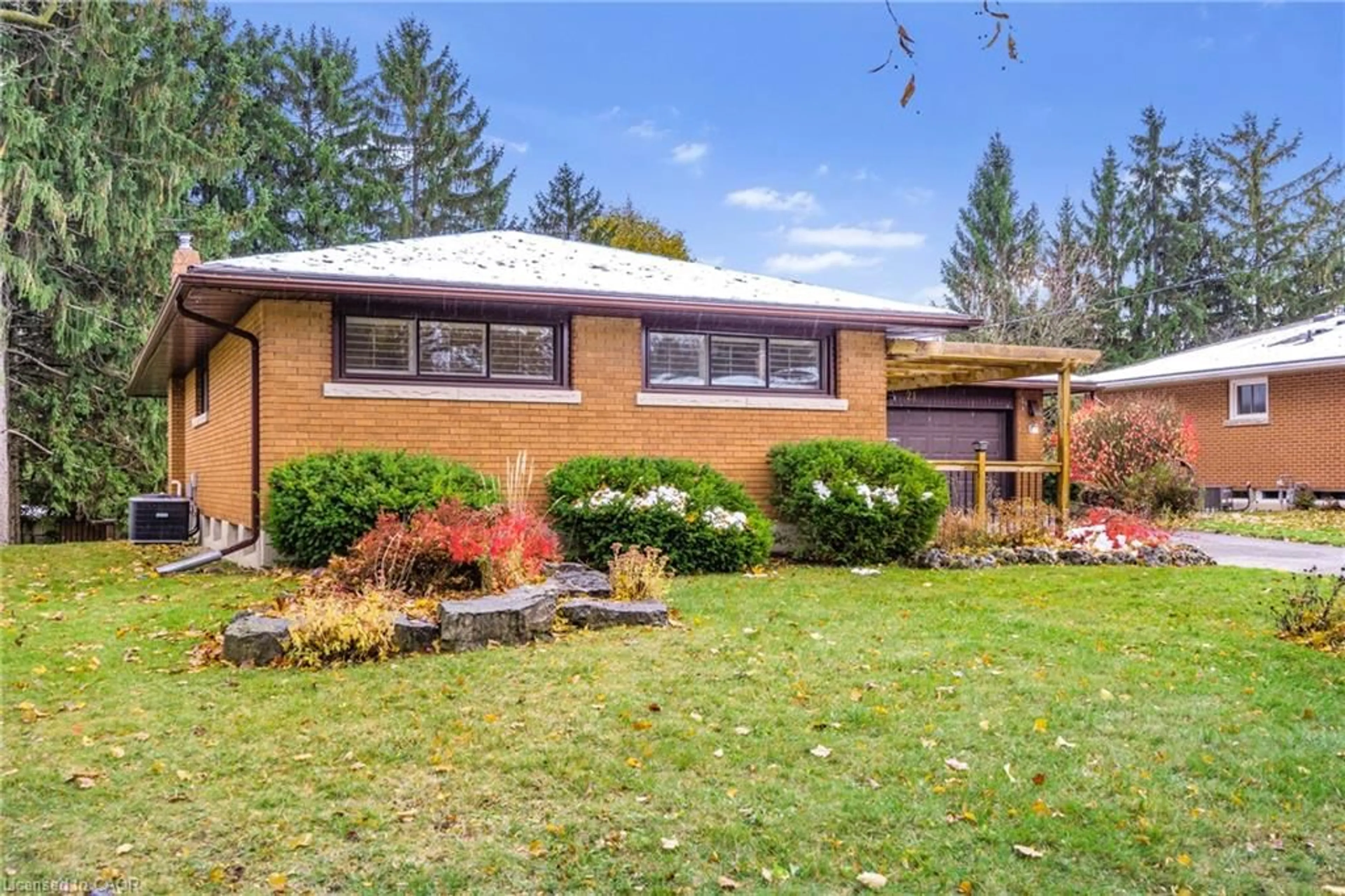 Home with brick exterior material, street for 21 Cyprus Dr, Kitchener Ontario N2M 4R4