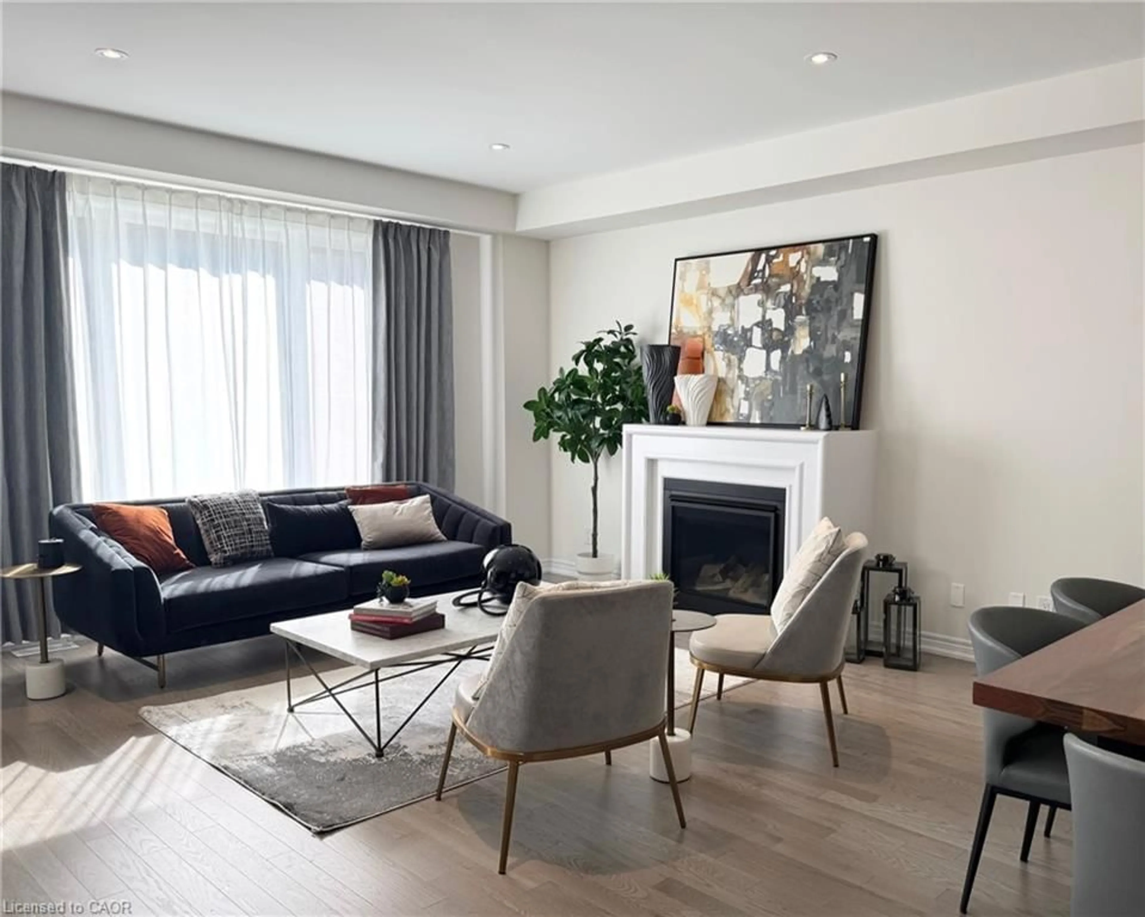 Living room with furniture, wood/laminate floor for 258 Histand Trail, Kitchener Ontario N2R 0T7