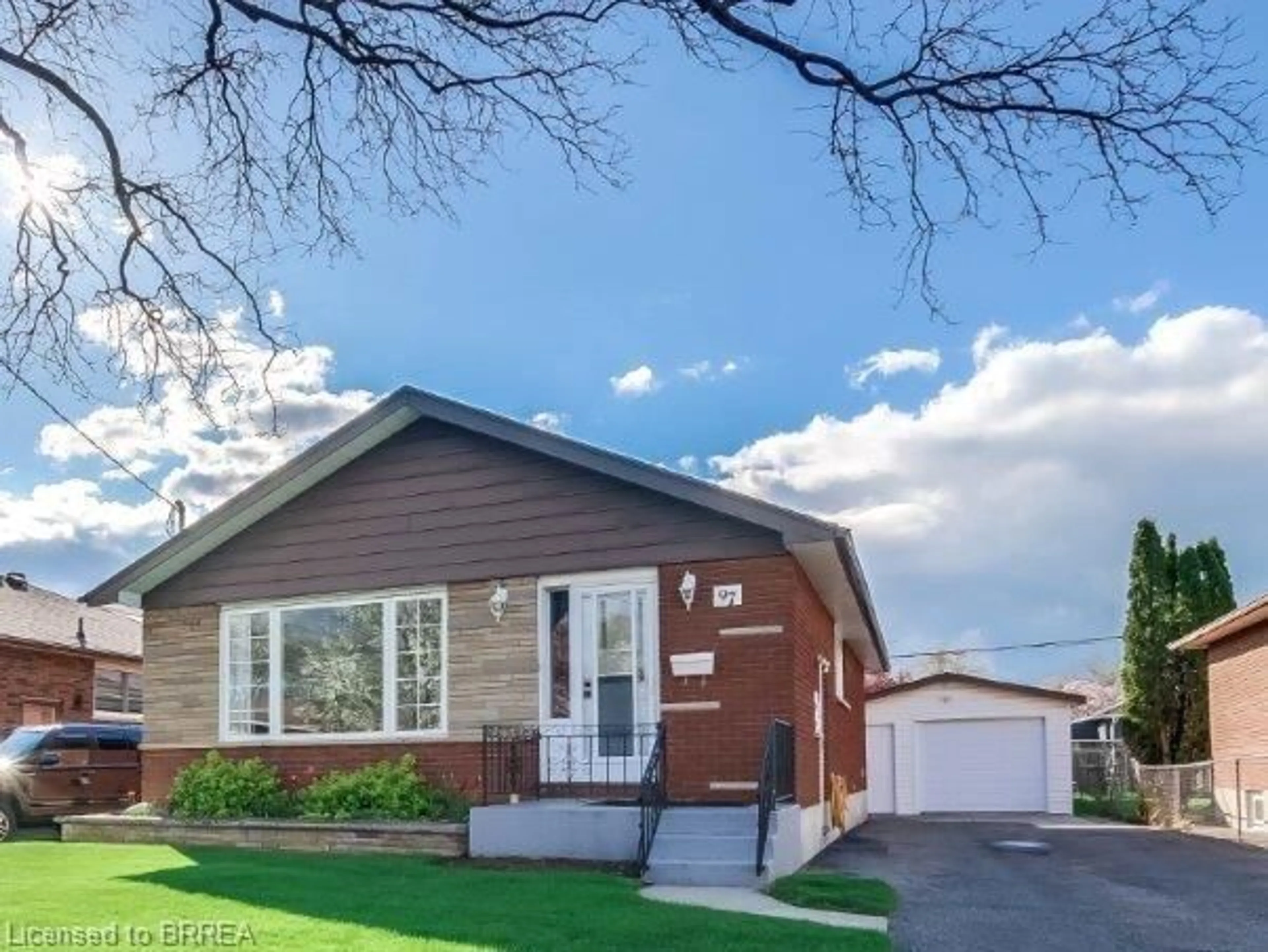 Home with brick exterior material, street for 97 Seventh Ave, Brantford Ontario N3S 1B7