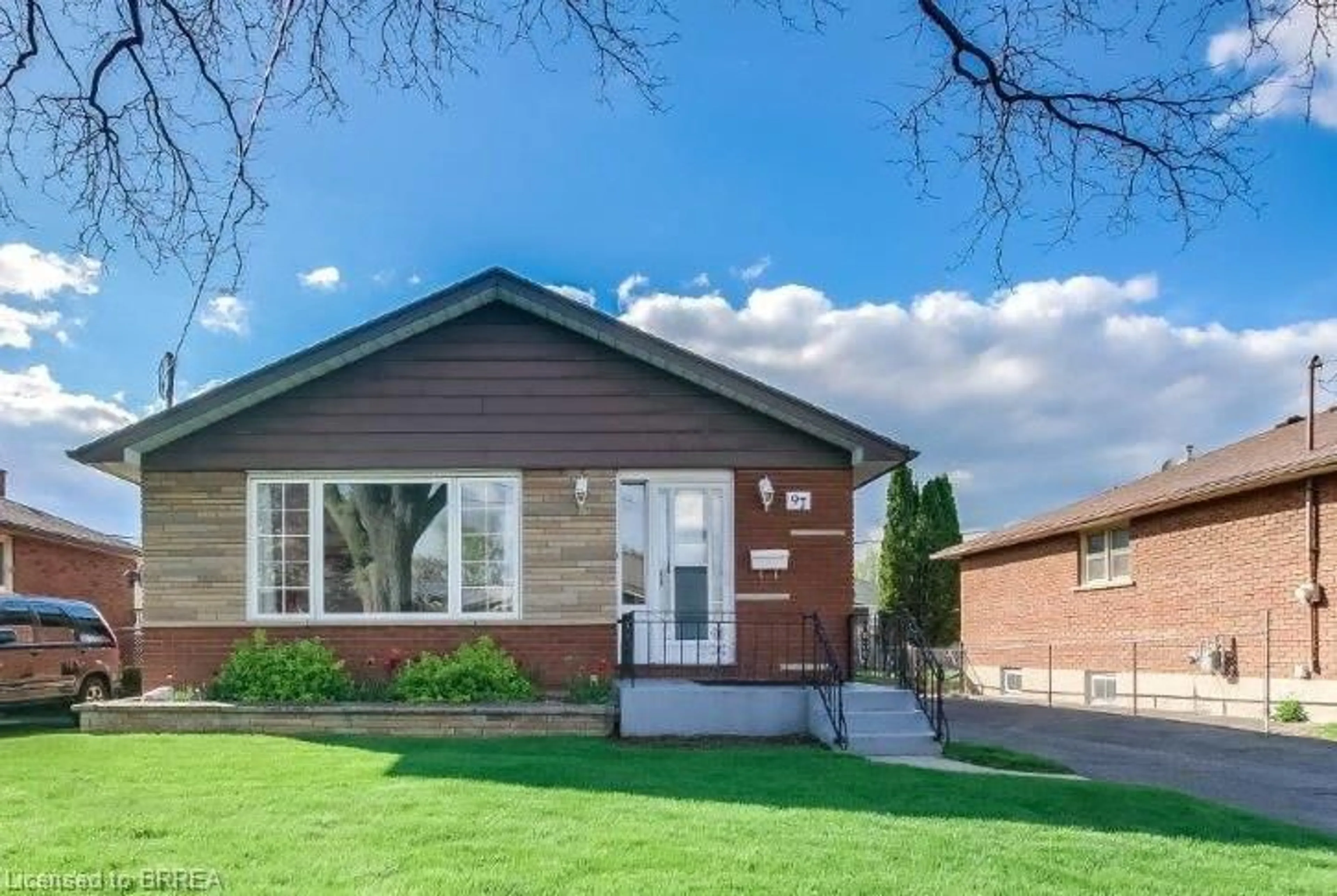 Home with brick exterior material, street for 97 Seventh Ave, Brantford Ontario N3S 1B7