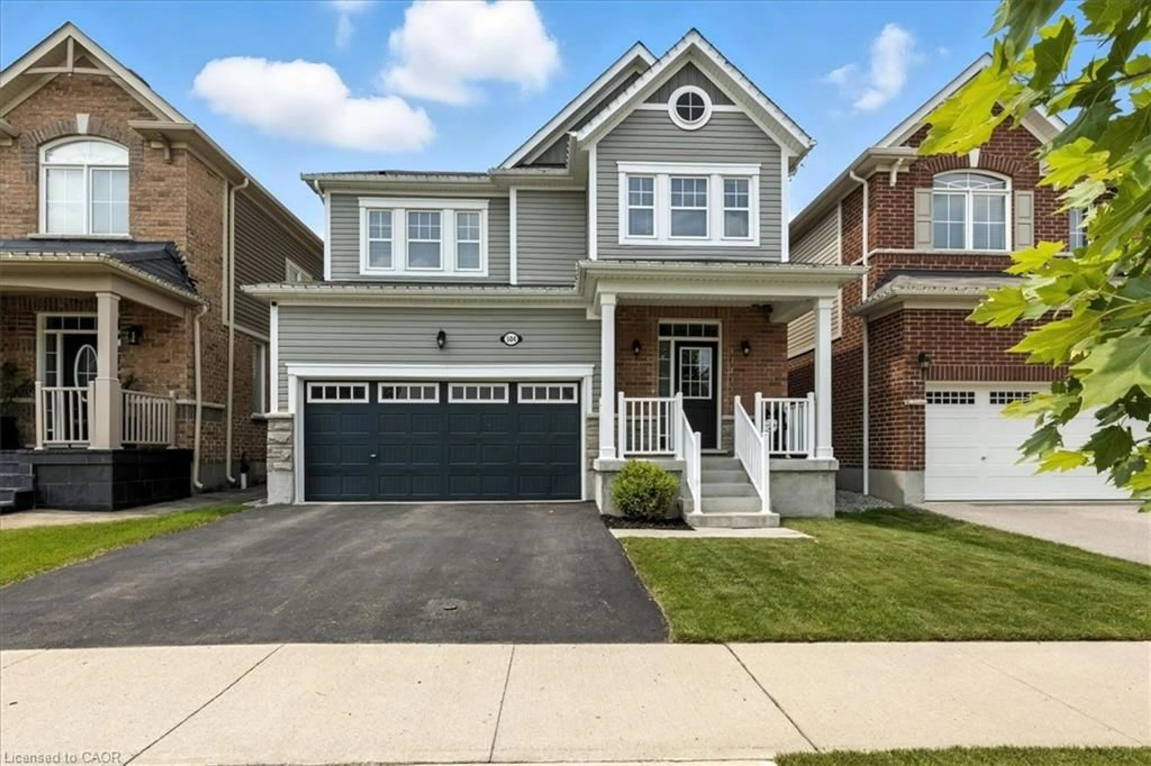Home with vinyl exterior material, street for 504 Equestrian Way, Cambridge Ontario N3E 0B5