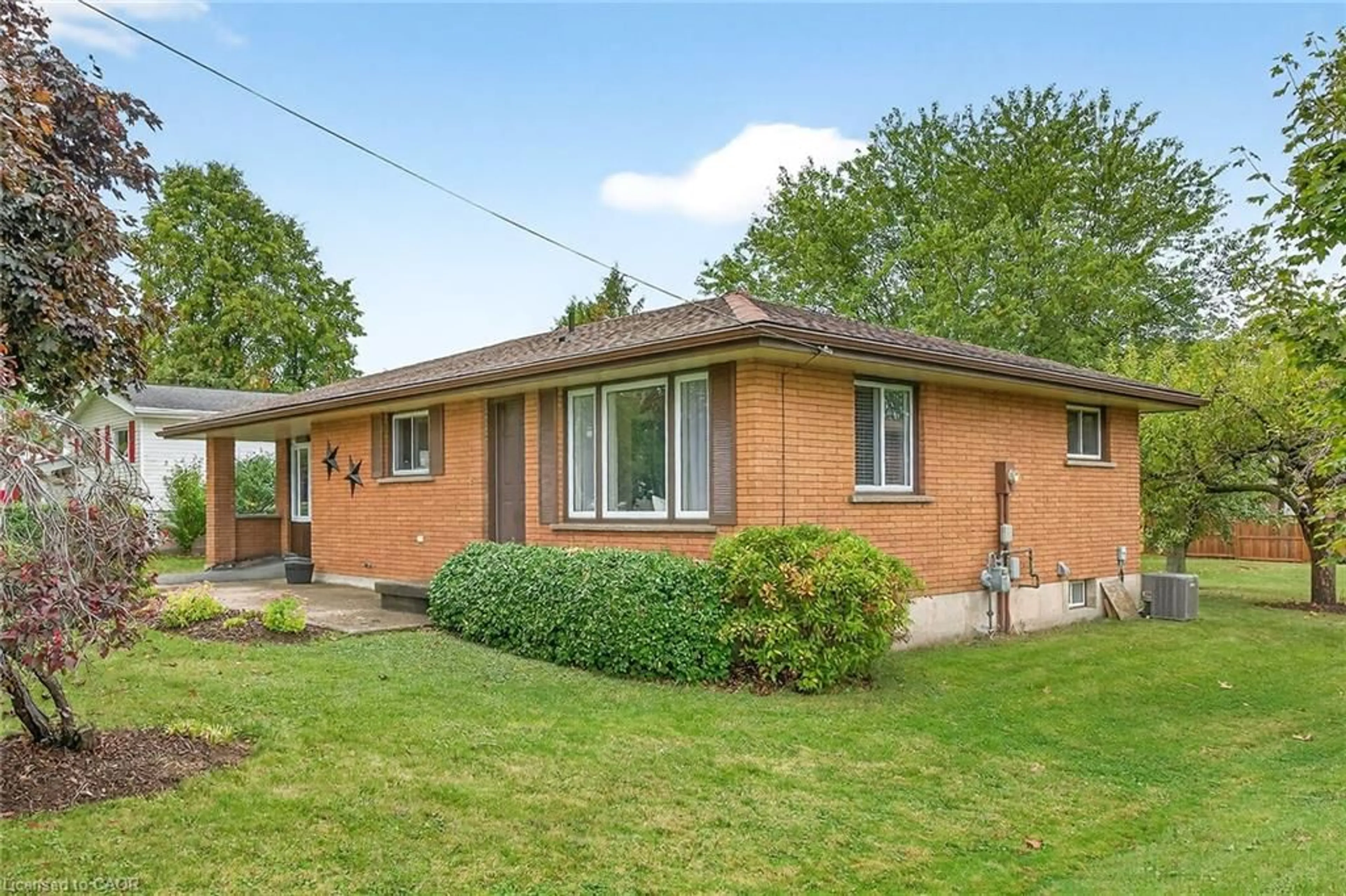 Home with brick exterior material, street for 49 Erie Ave, Fisherville Ontario N0A 1G0