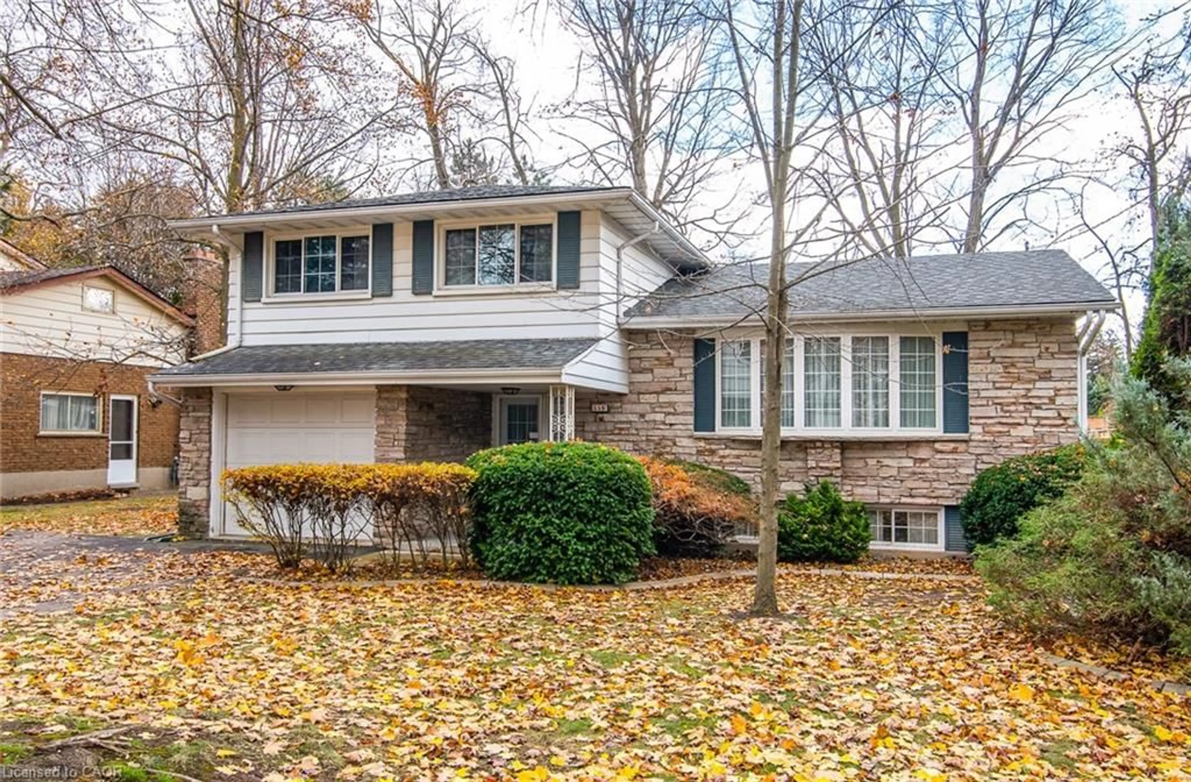 Home with vinyl exterior material, street for 155 Shuh Ave, Kitchener Ontario N2A 1H4