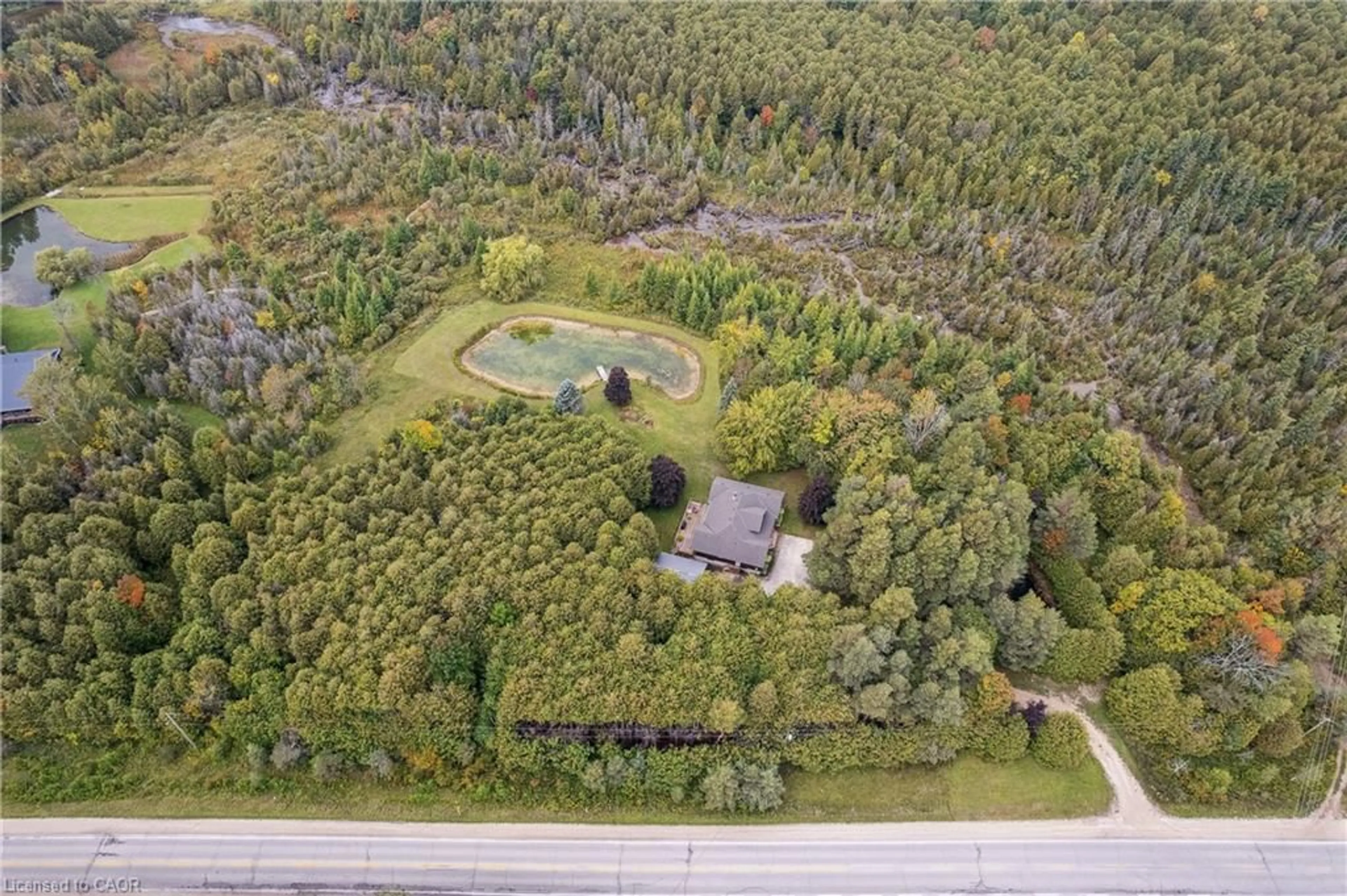 A pic from outside/outdoor area/front of a property/back of a property/a pic from drone, forest/trees view for 403277 Grey Rd 4, Durham Ontario N0G 1R0