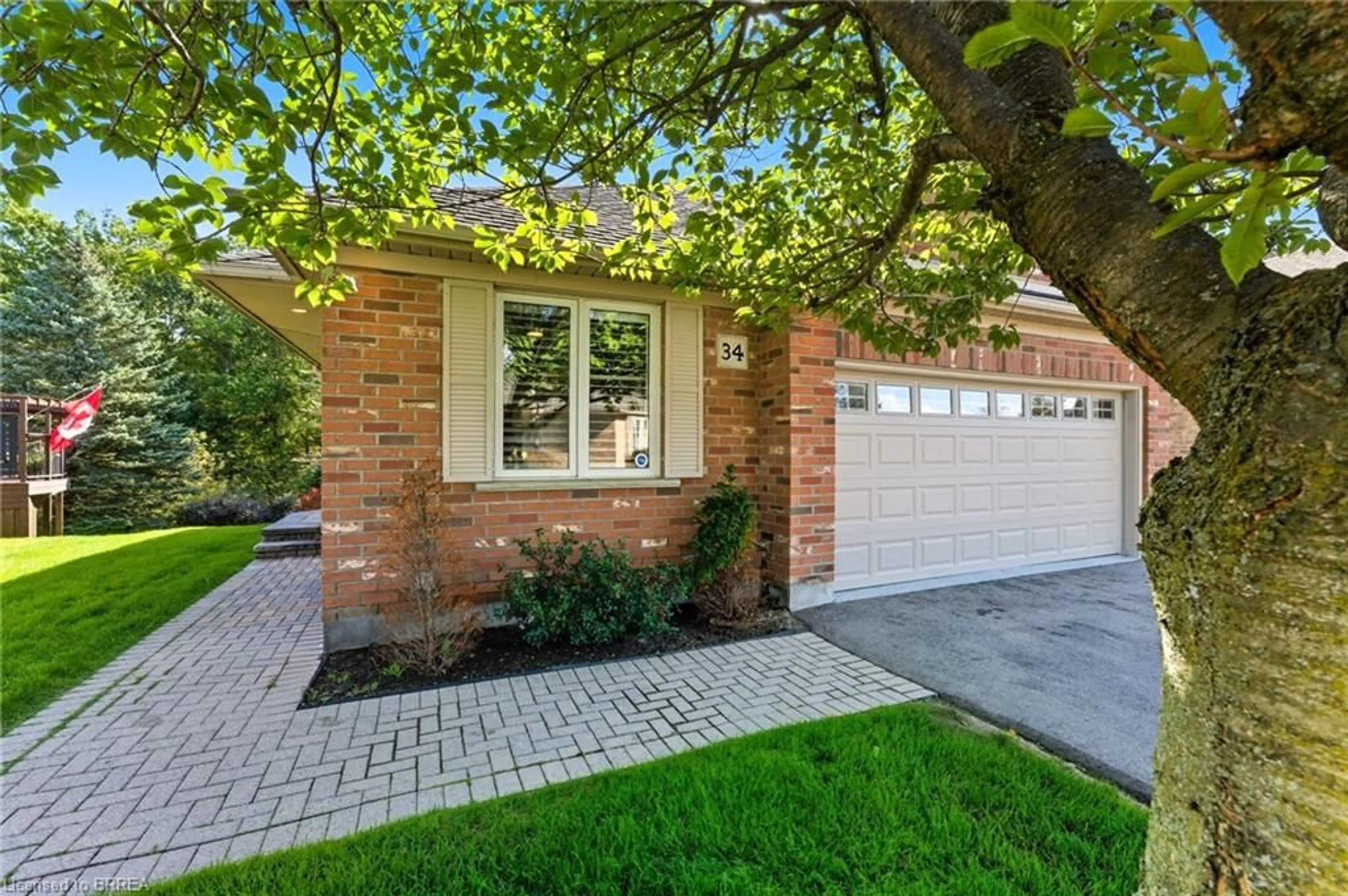 Home with brick exterior material, street for 422 Powerline Rd #34, Brantford Ontario N3R 8A1