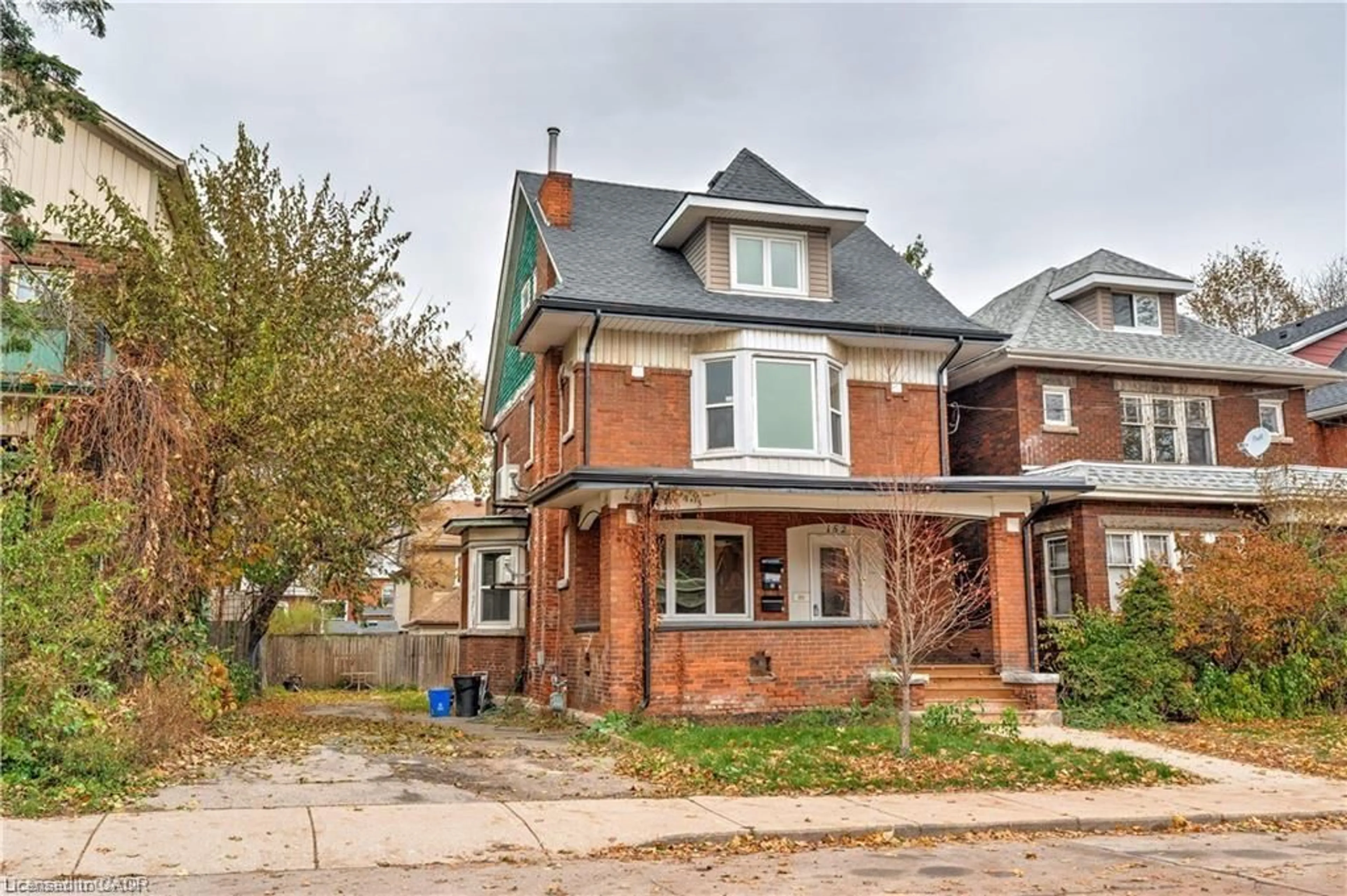 Home with brick exterior material, street for 152 Sanford Ave, Hamilton Ontario L8M 2G9