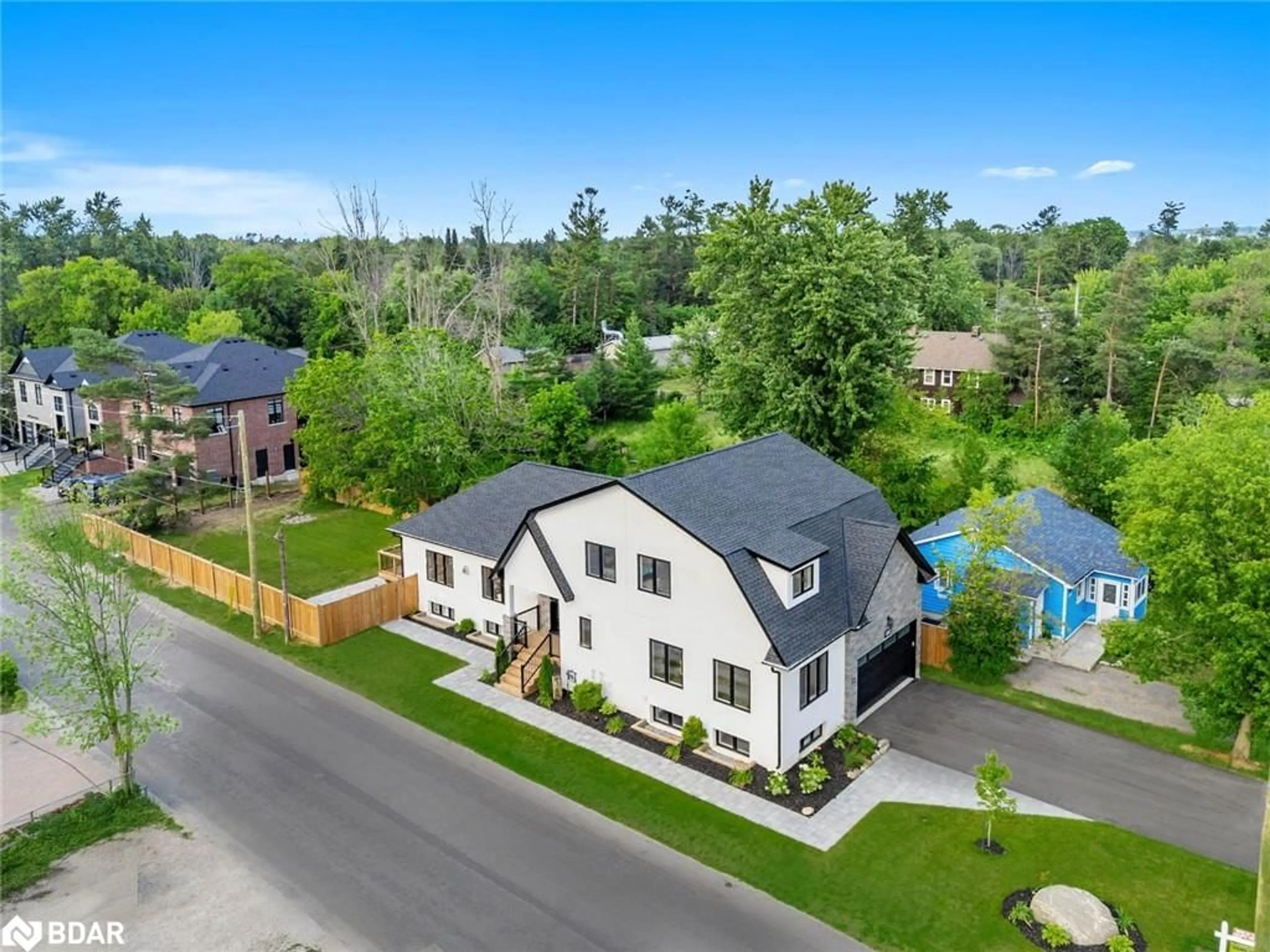A pic from outside/outdoor area/front of a property/back of a property/a pic from drone, street for 1242 Killarney Beach Rd, Innisfil Ontario L0L 1W0