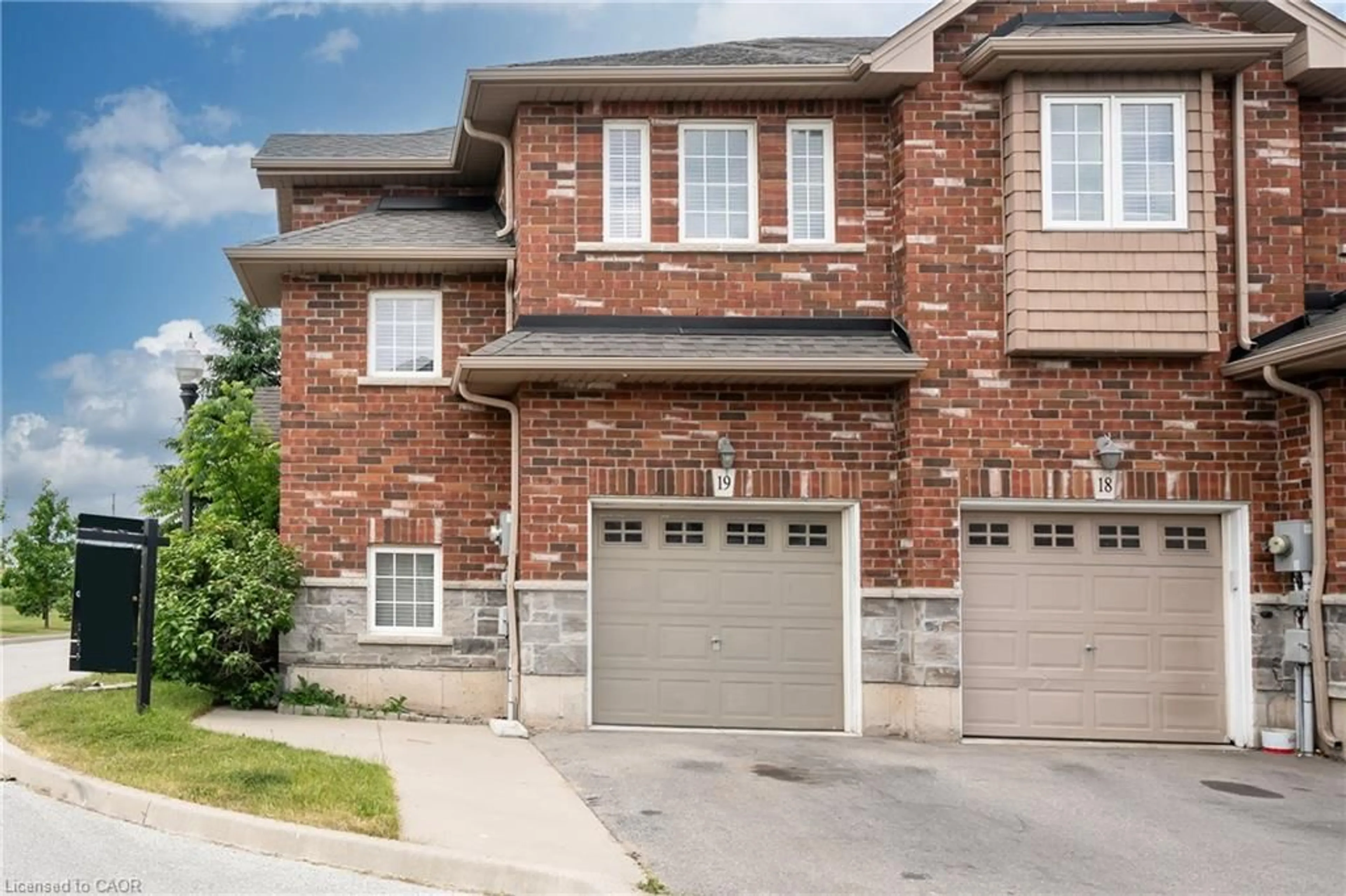 Home with brick exterior material, street for 45 Seabreeze Cres #19, Stoney Creek Ontario L8E 5C8