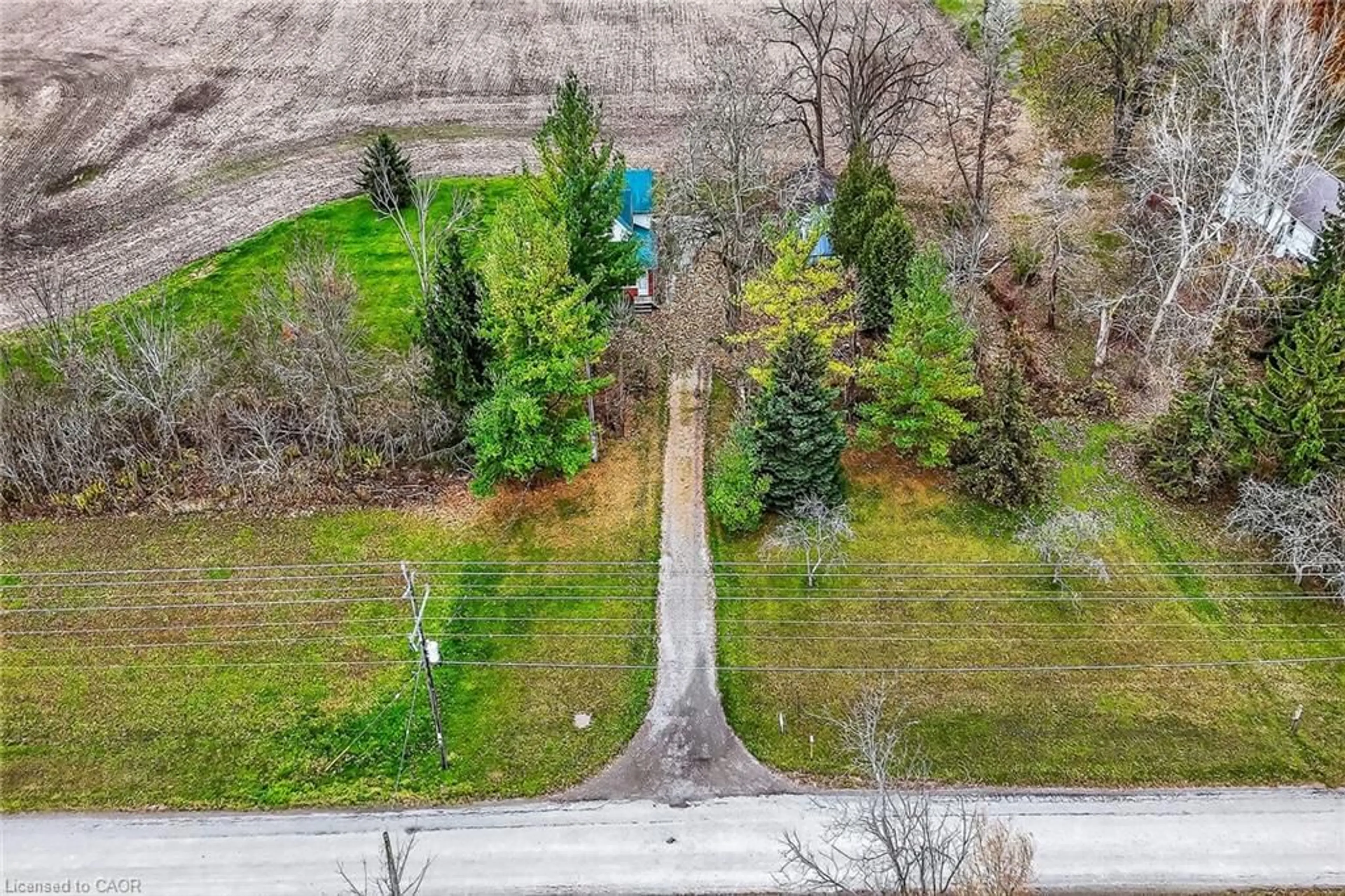 A pic from outside/outdoor area/front of a property/back of a property/a pic from drone, forest/trees view for 14 Feeder Canal Rd, Dunnville Ontario N0A 1K0