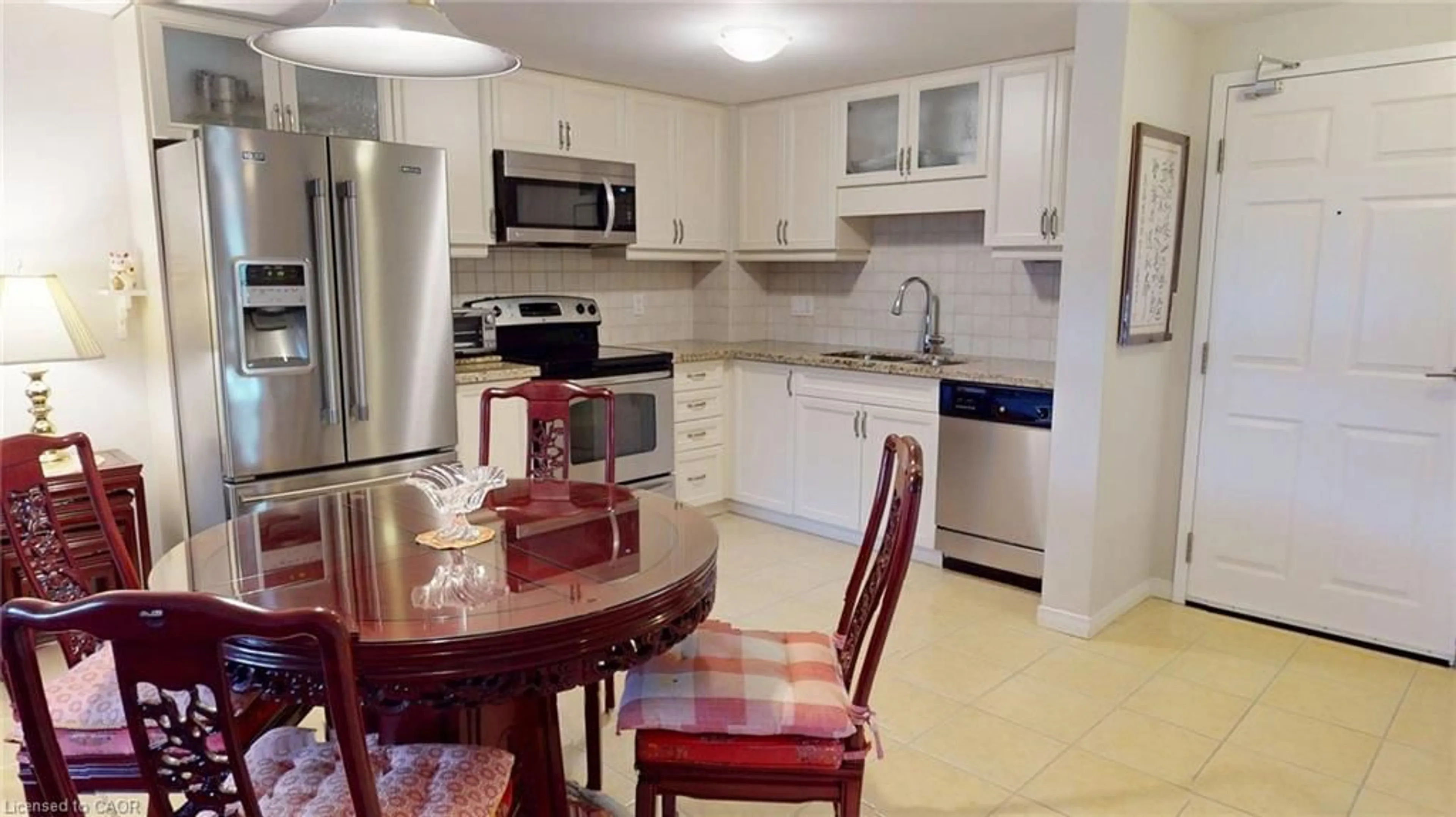 Standard kitchen, ceramic/tile floor for 345 Fisher Mills Rd #103, Cambridge Ontario N3C 0E5