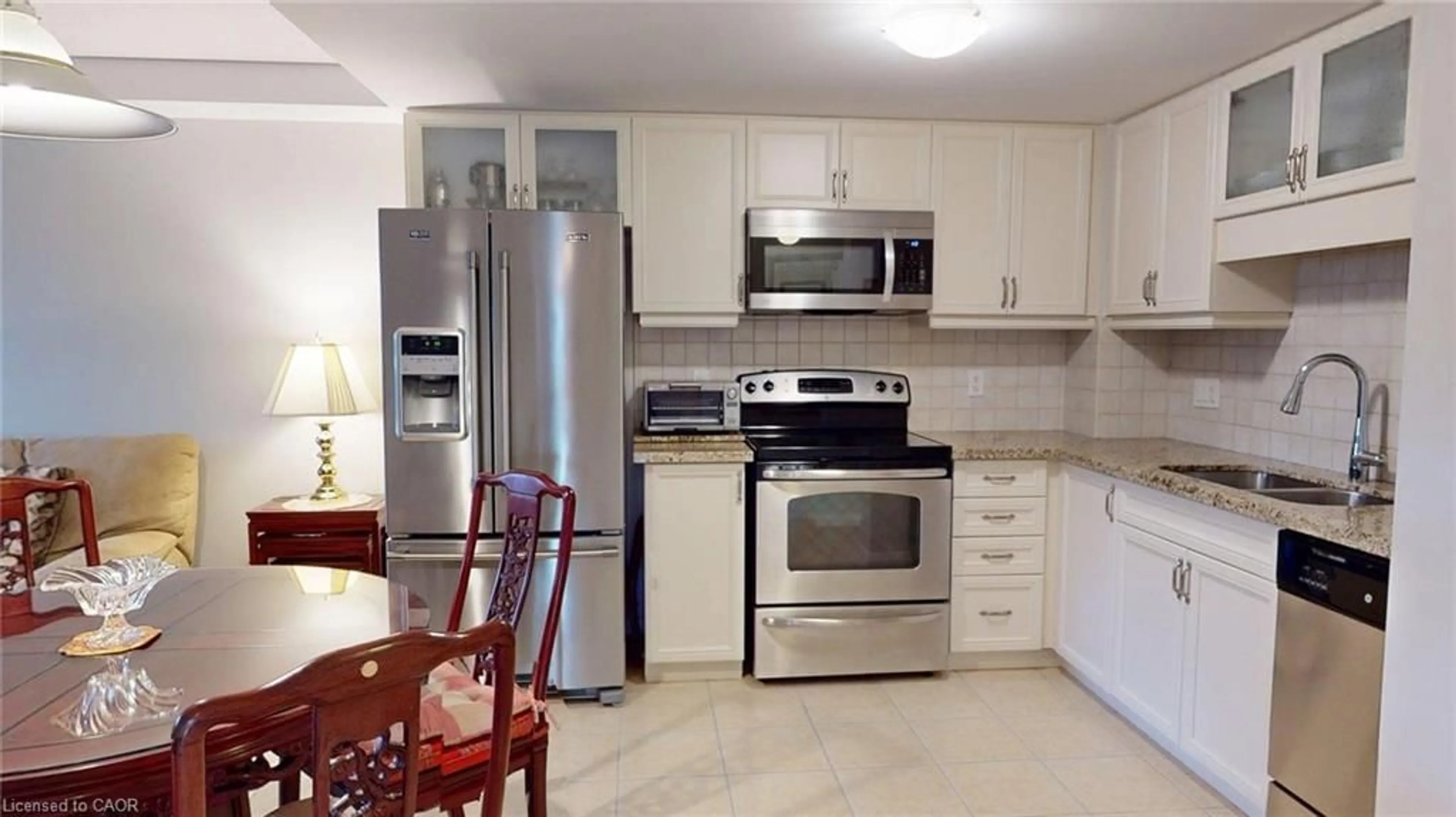 Standard kitchen, ceramic/tile floor for 345 Fisher Mills Rd #103, Cambridge Ontario N3C 0E5
