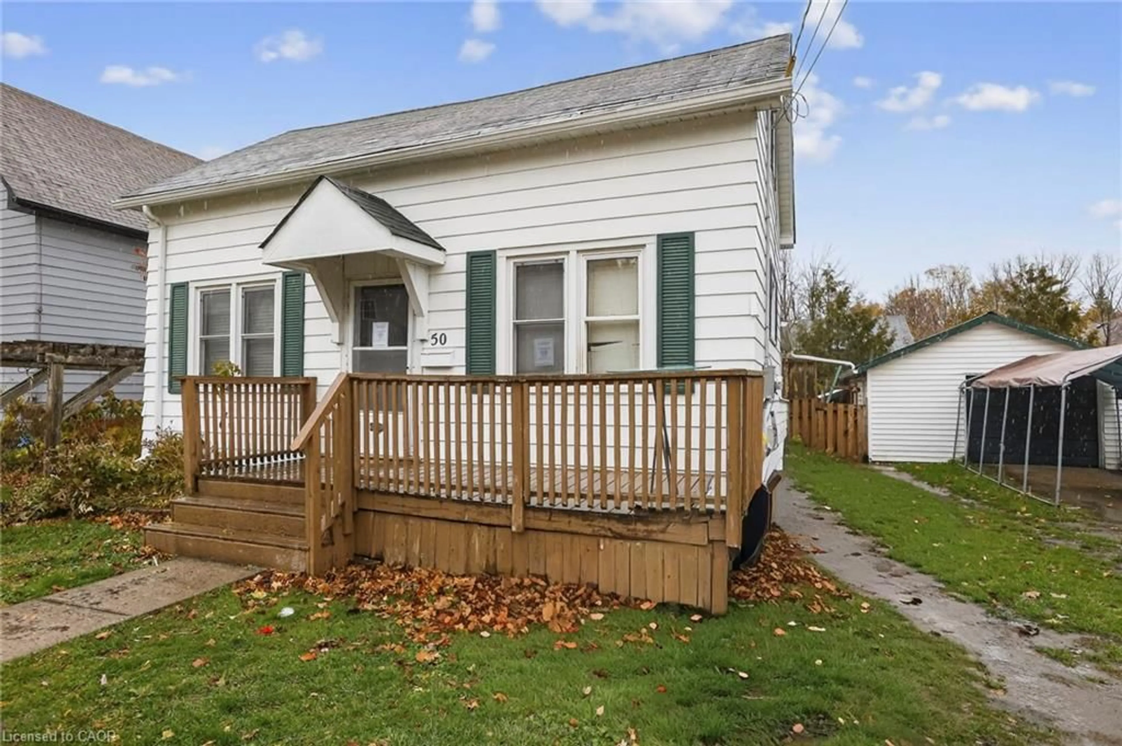 Home with vinyl exterior material, street for 50 Ridout St, Lindsay Ontario K9V 2B6