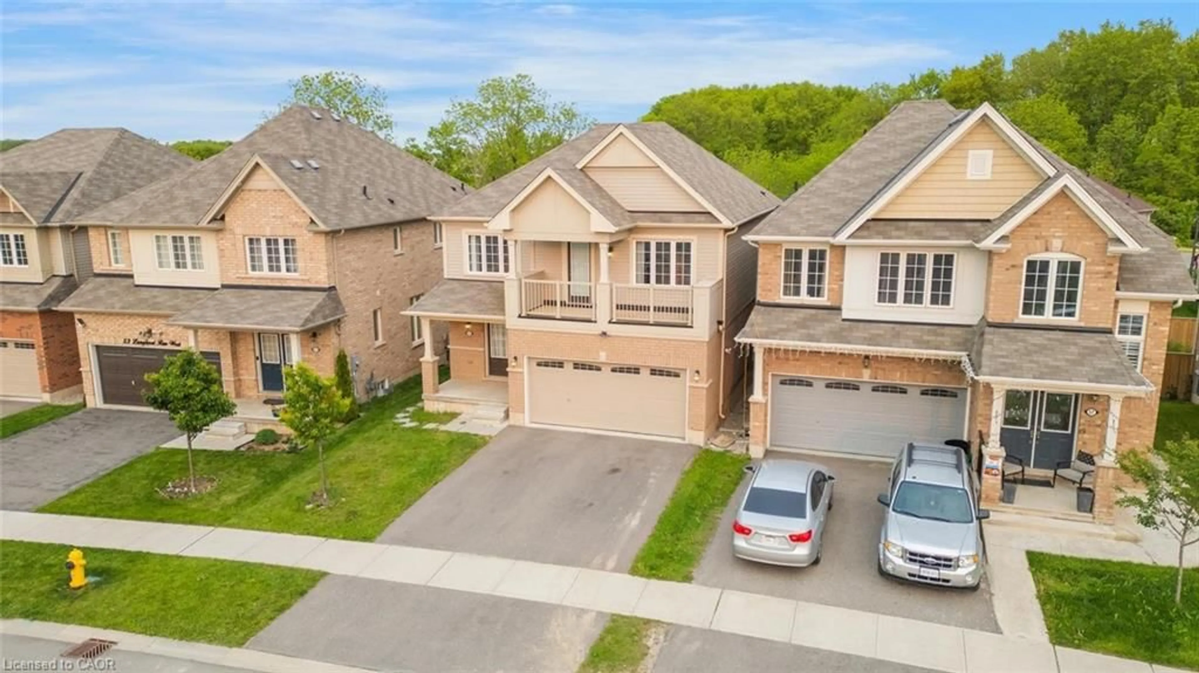 A pic from outside/outdoor area/front of a property/back of a property/a pic from drone, street for 55 Longboat Run, Brantford Ontario N3T 0P5