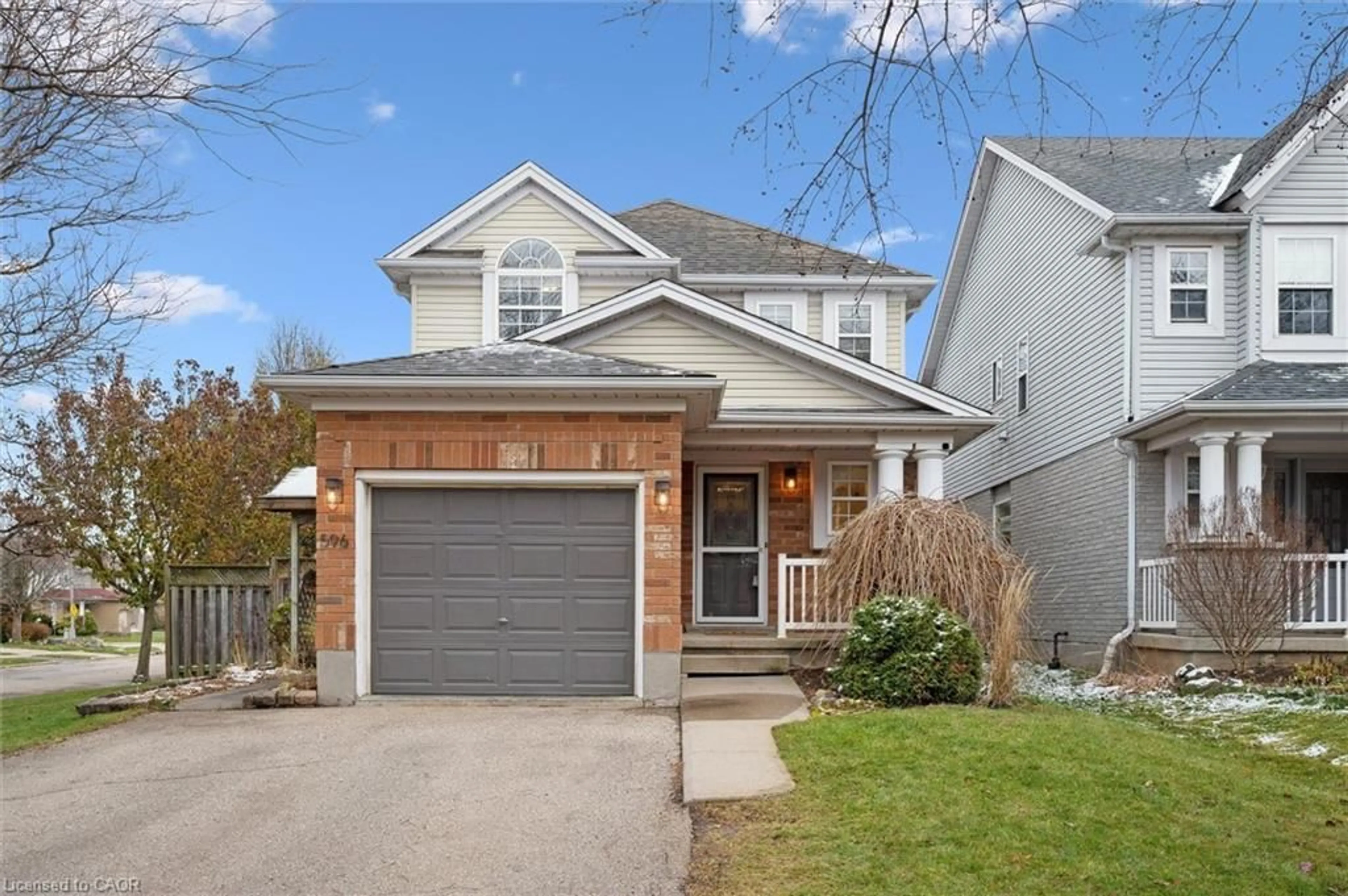 Home with brick exterior material, street for 596 Canso Pl, Waterloo Ontario N2K 3Z6