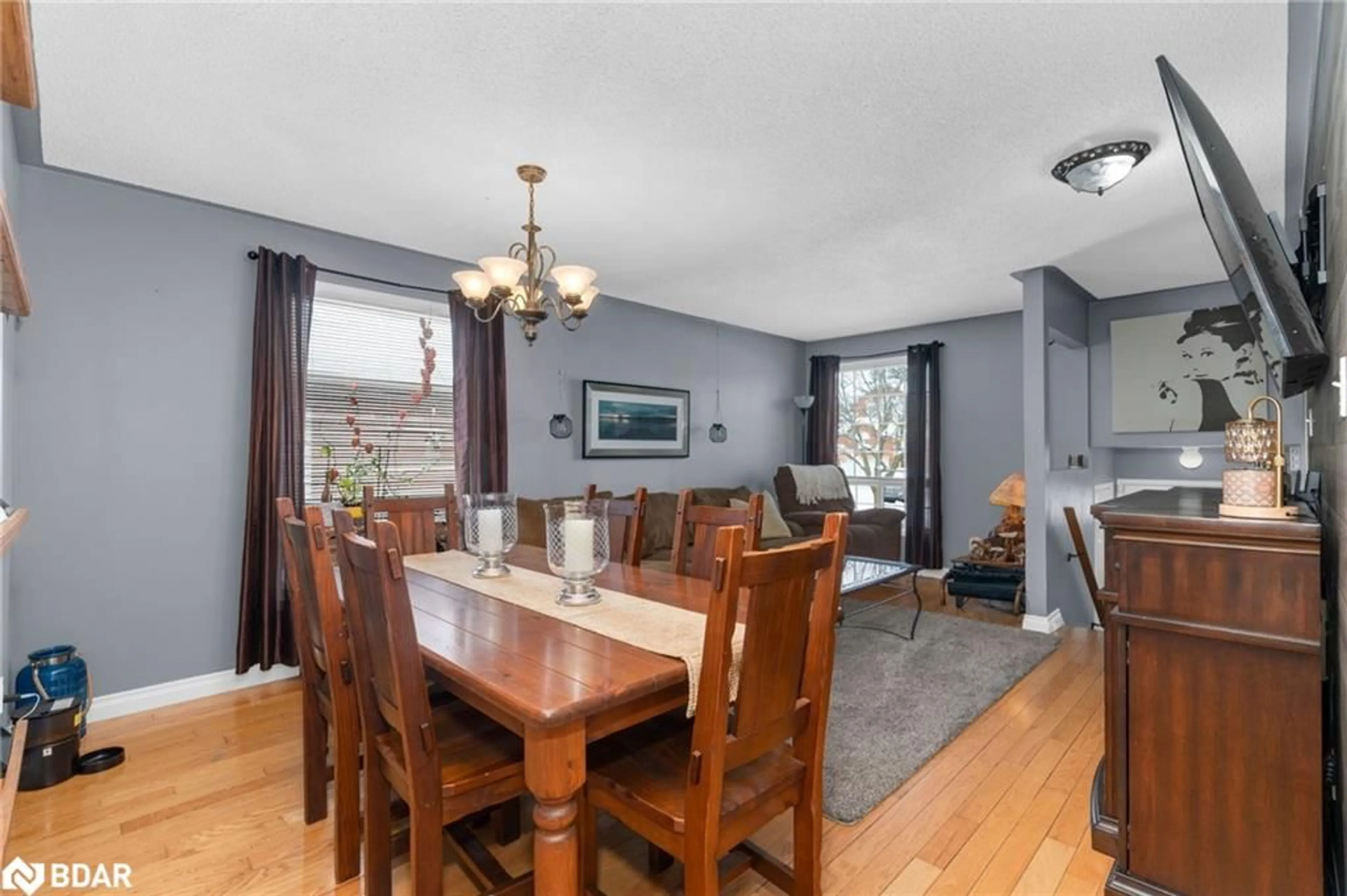 Dining room, wood/laminate floor for 13 Kate Aitken Cres, New Tecumseth Ontario L0G 1A0