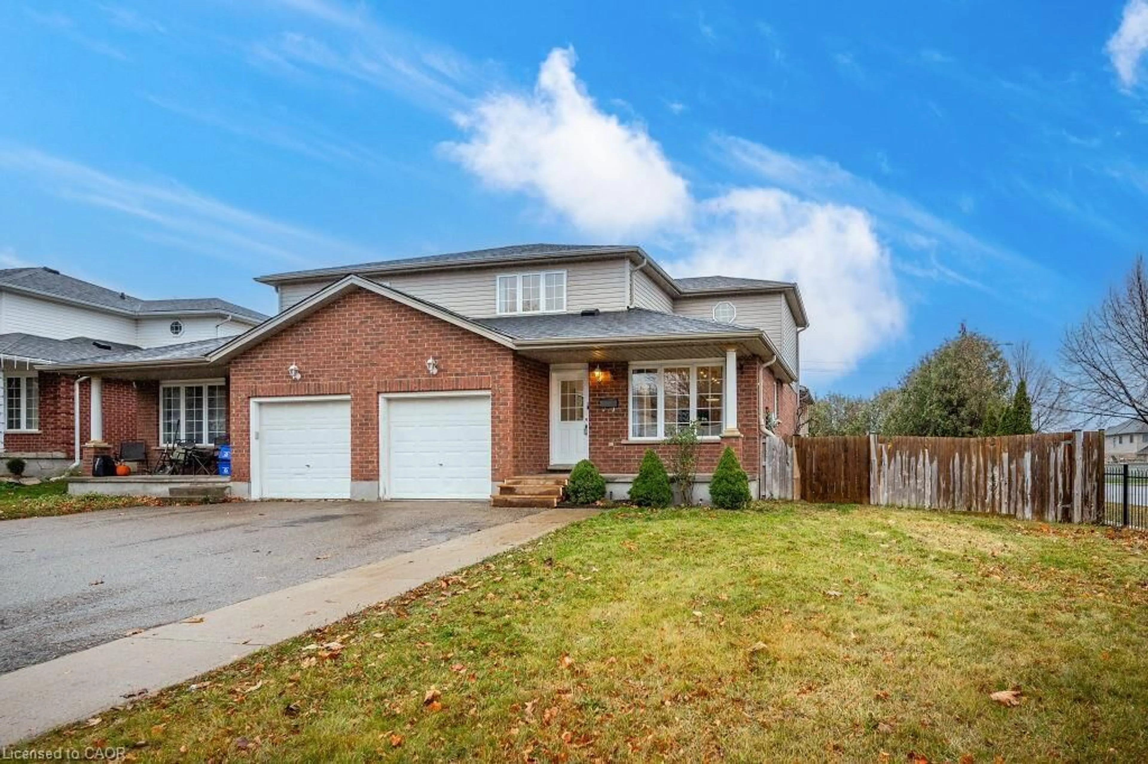 Home with brick exterior material, street for 61 Schueller St, Kitchener Ontario N2K 3W2