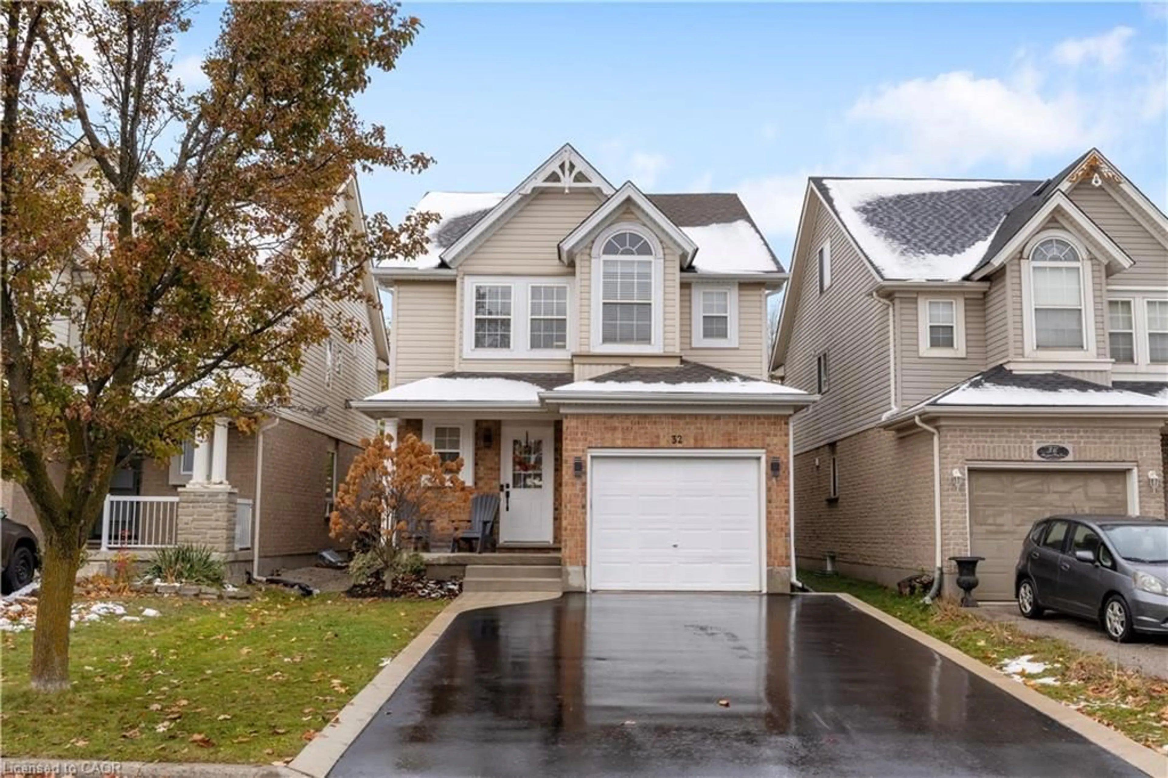 Home with vinyl exterior material, street for 32 Maryann Price Lane, Cambridge Ontario N3C 4K6