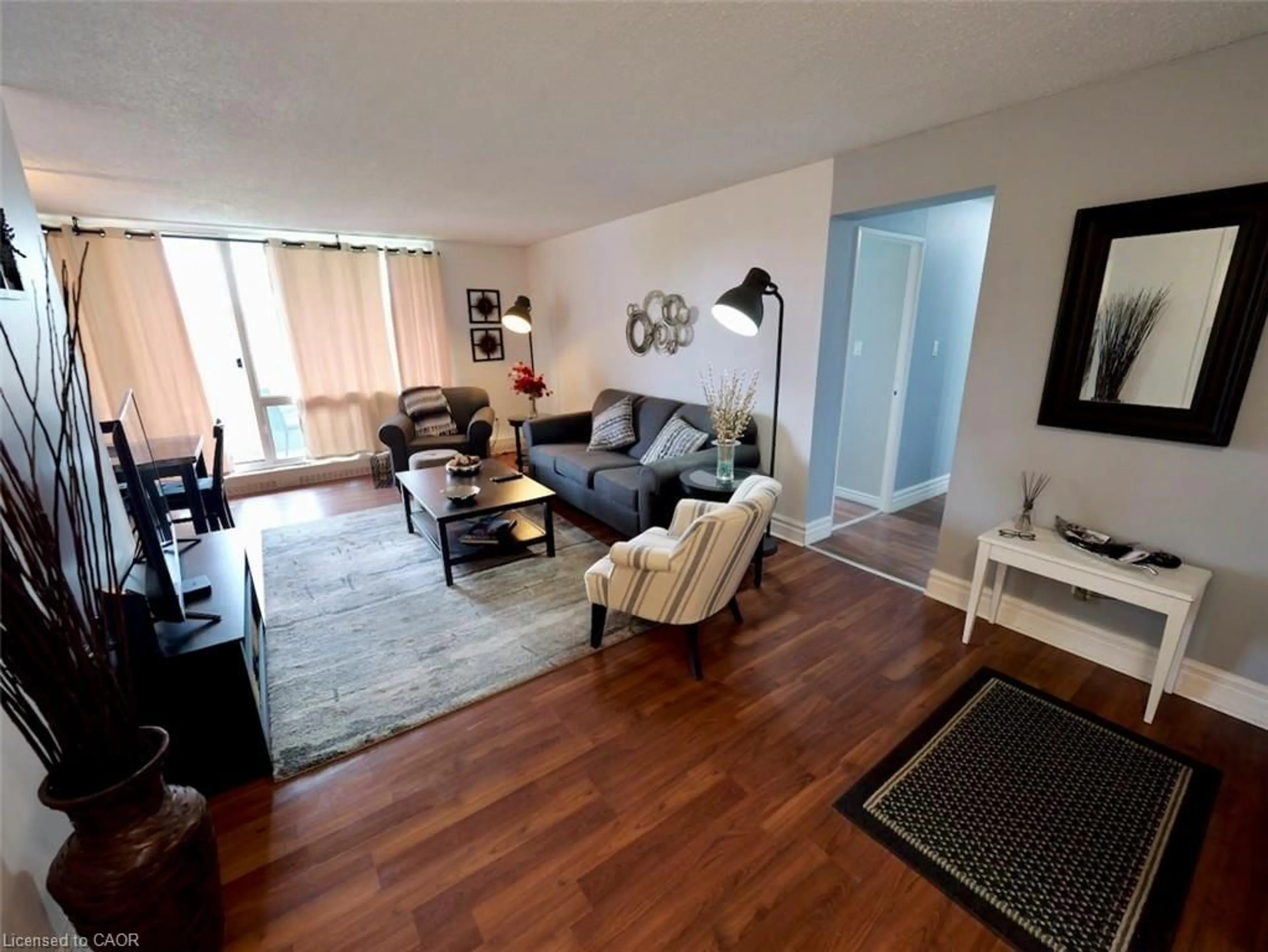 Living room with furniture, unknown for 225 Harvard Pl #603, Waterloo Ontario N2J 4H4