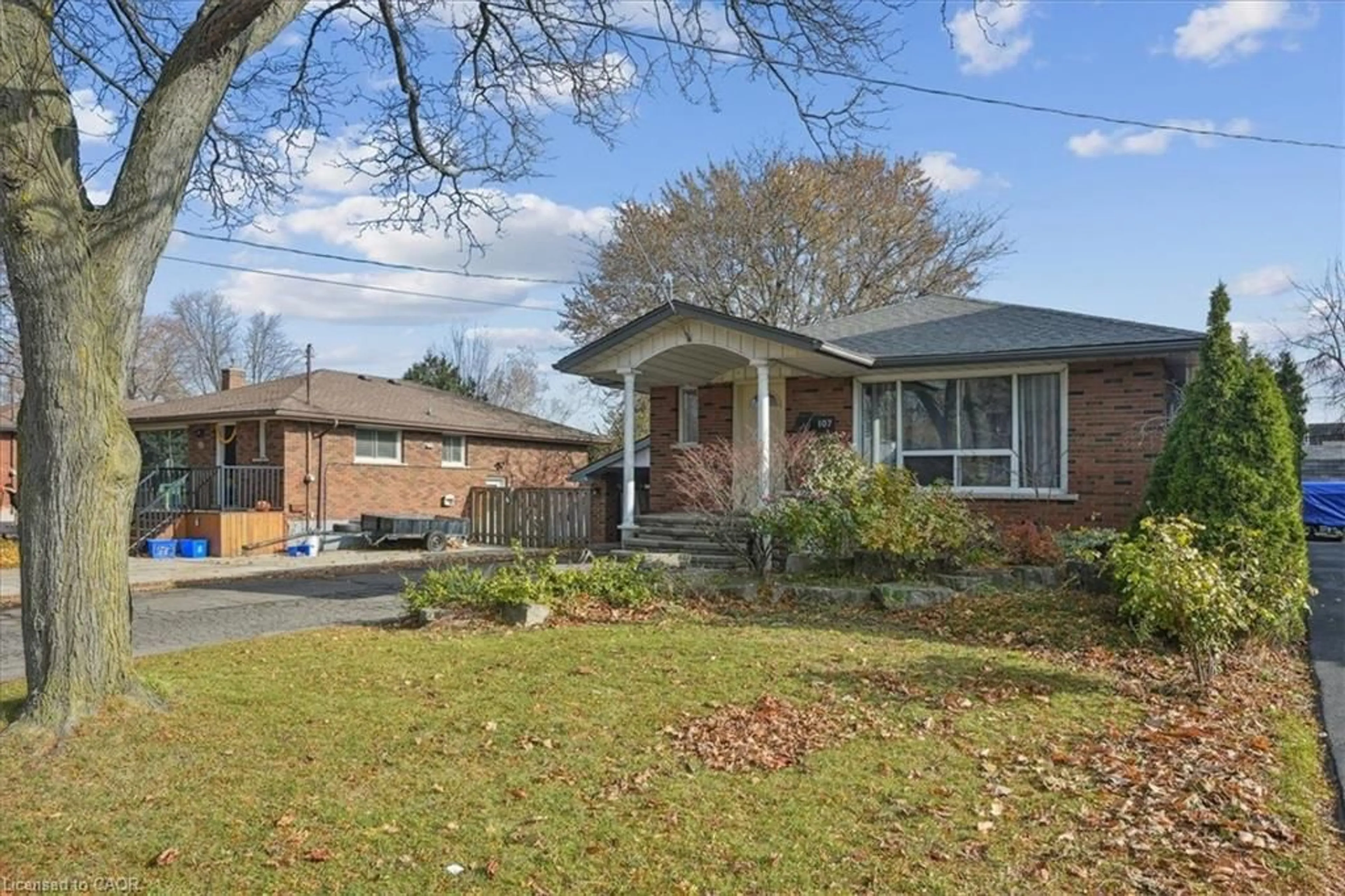 Home with brick exterior material, street for 107 Deschene Ave, Hamilton Ontario L9A 3J9