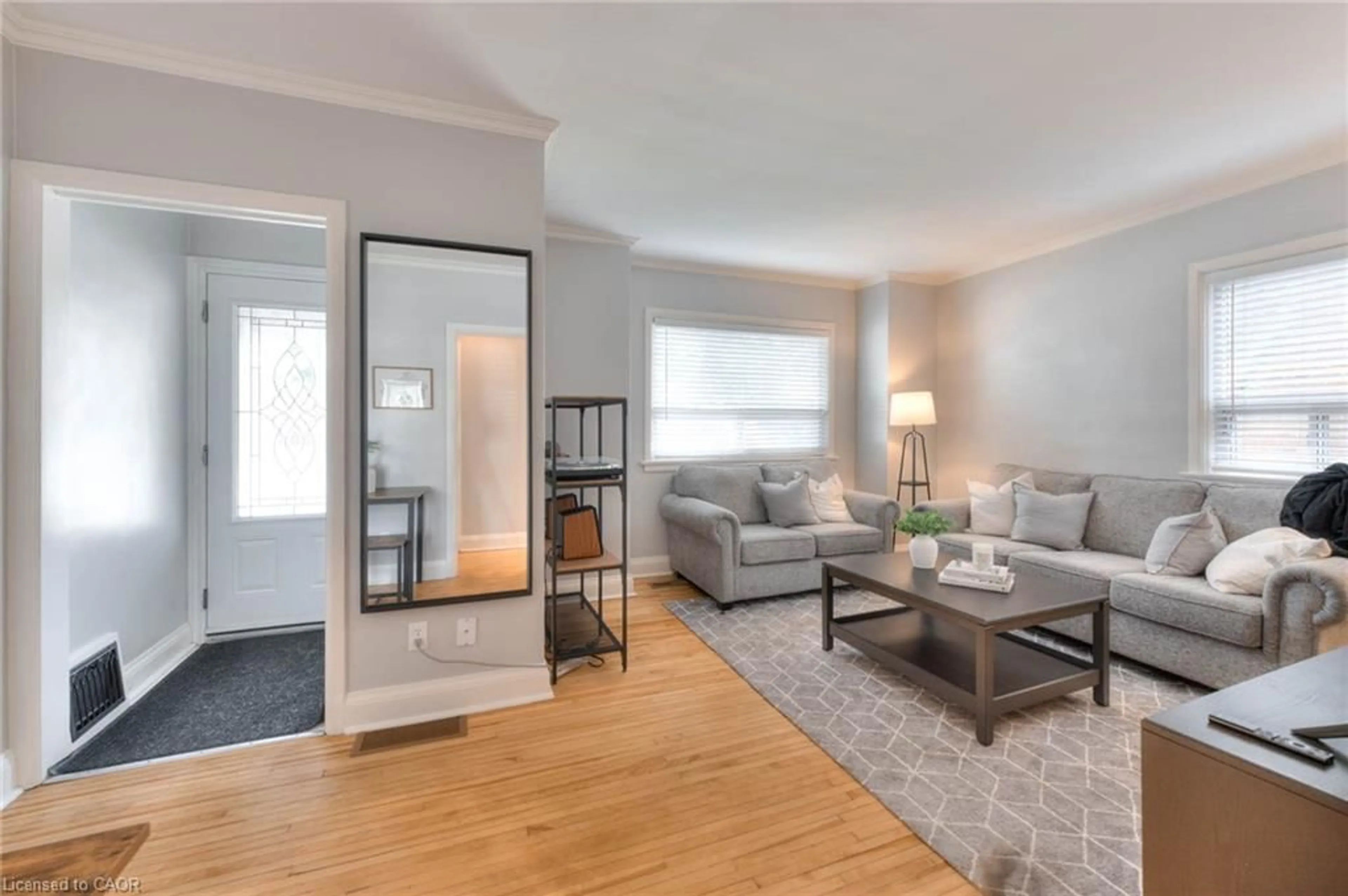 Living room with furniture, wood/laminate floor for 577 Stirling Ave, Kitchener Ontario N2M 3J5