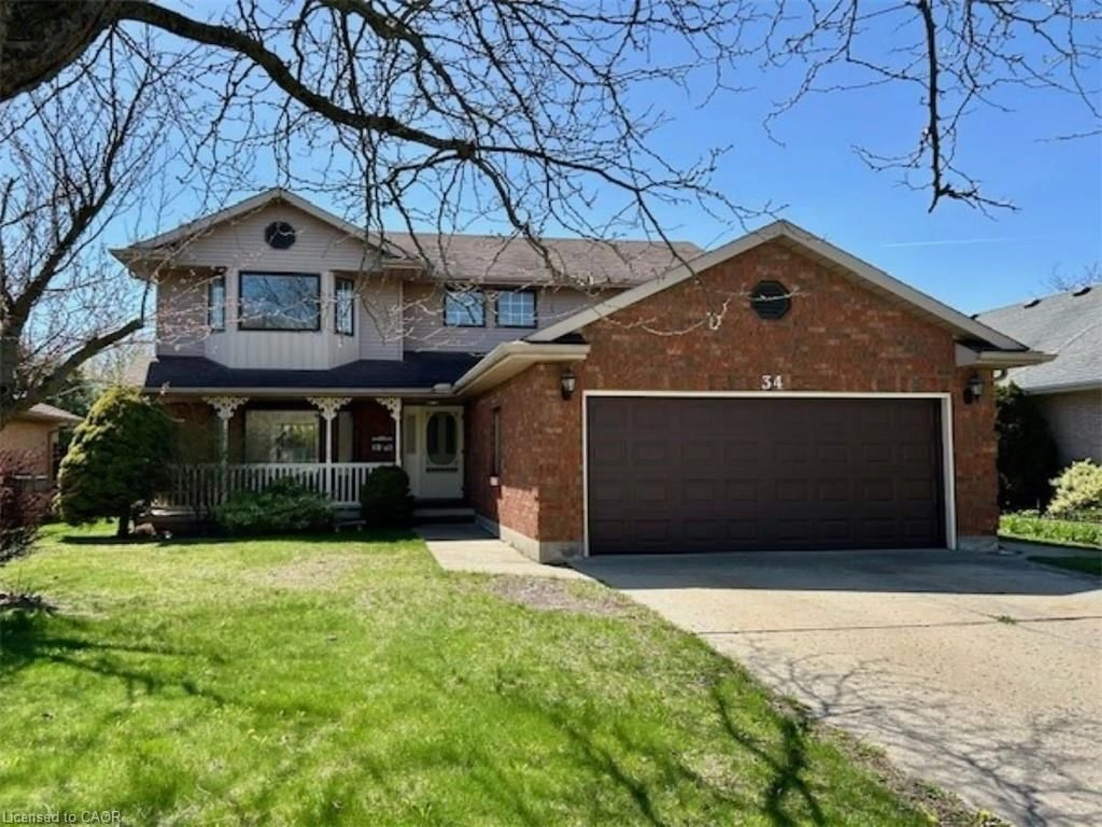 Home with brick exterior material, street for 34 Mann Ave, Simcoe Ontario N3Y 5J3