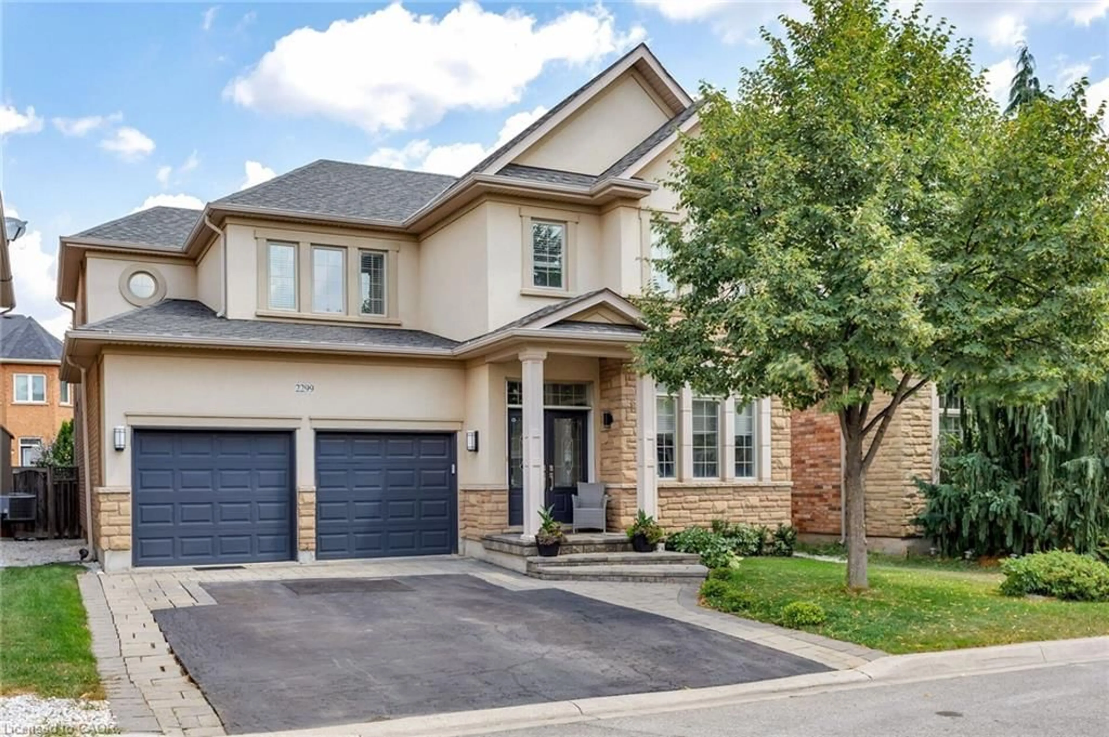 Home with brick exterior material, street for 2299 Millstone Dr, Oakville Ontario L6M 0H1