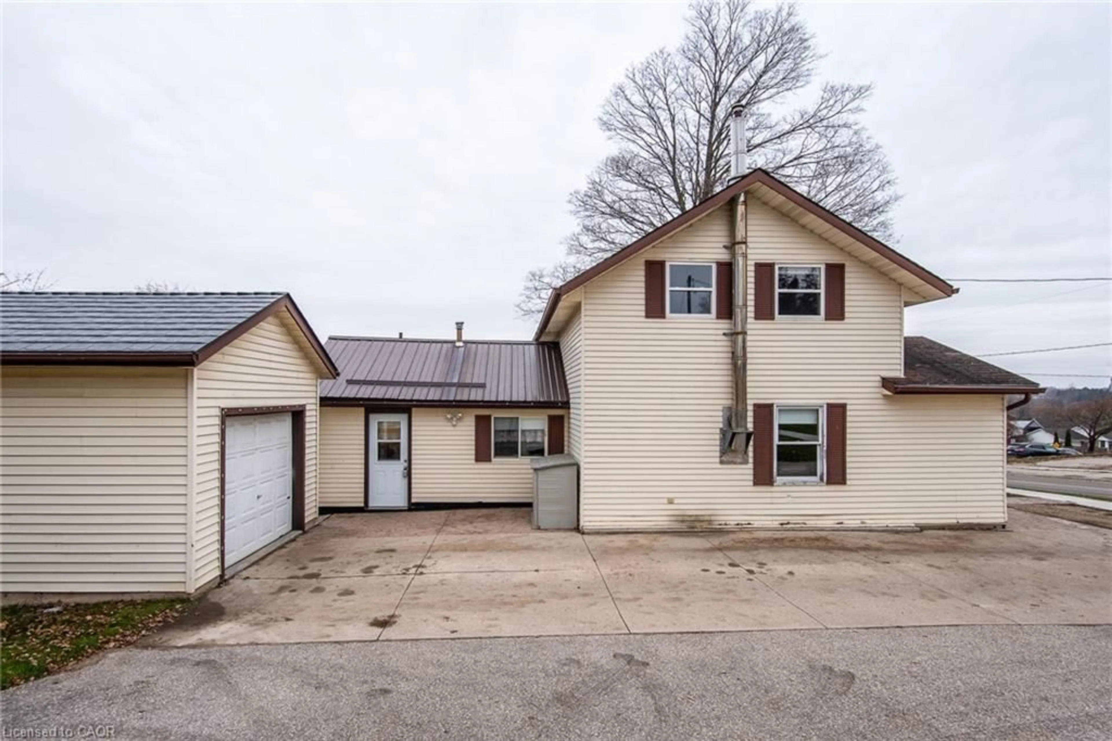 A pic from outside/outdoor area/front of a property/back of a property/a pic from drone, street for 73 Main St, Drayton Ontario N0G 1P0