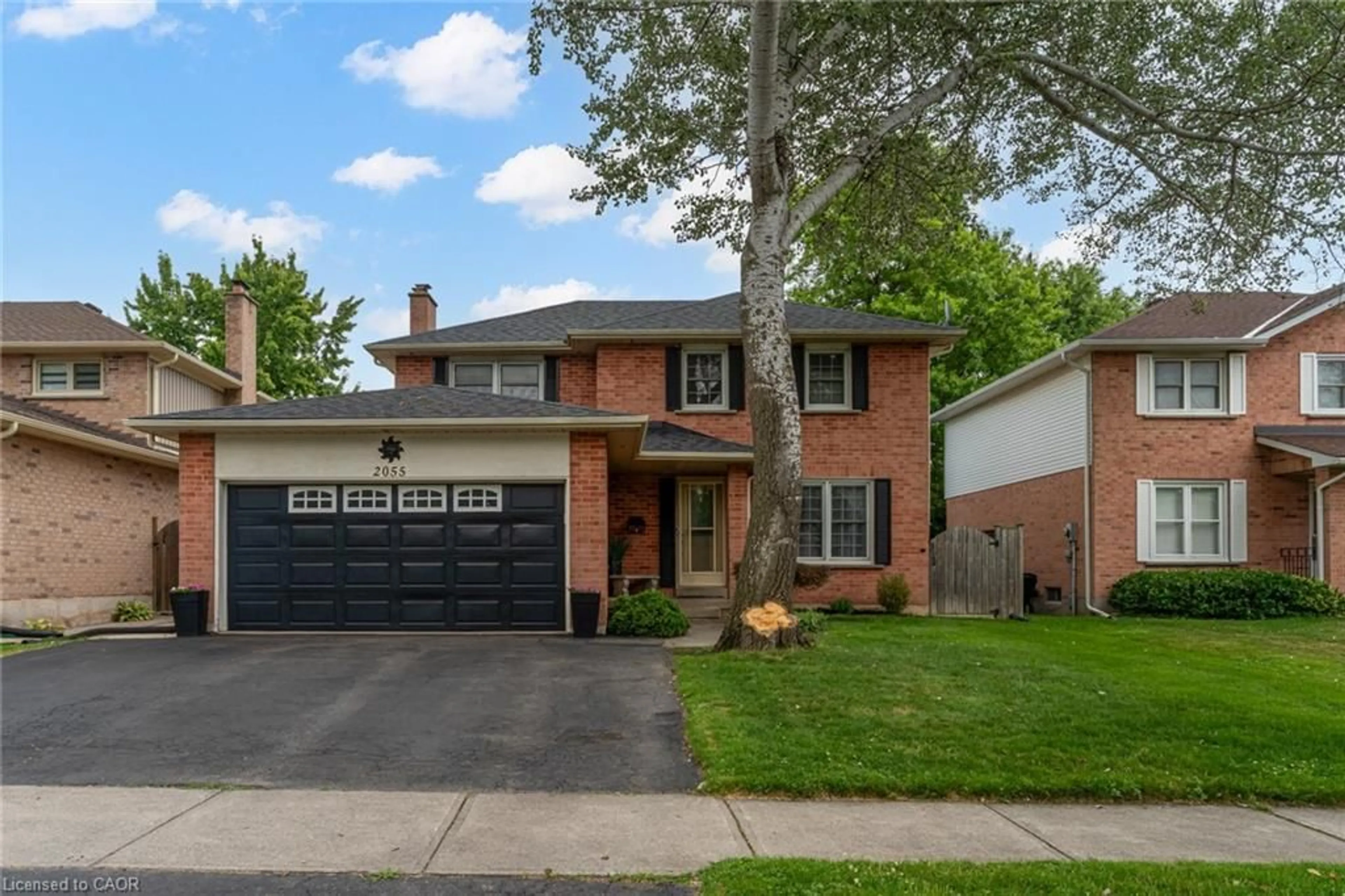 Home with brick exterior material, street for 2055 Hunters Wood Dr, Burlington Ontario L7M 2T9