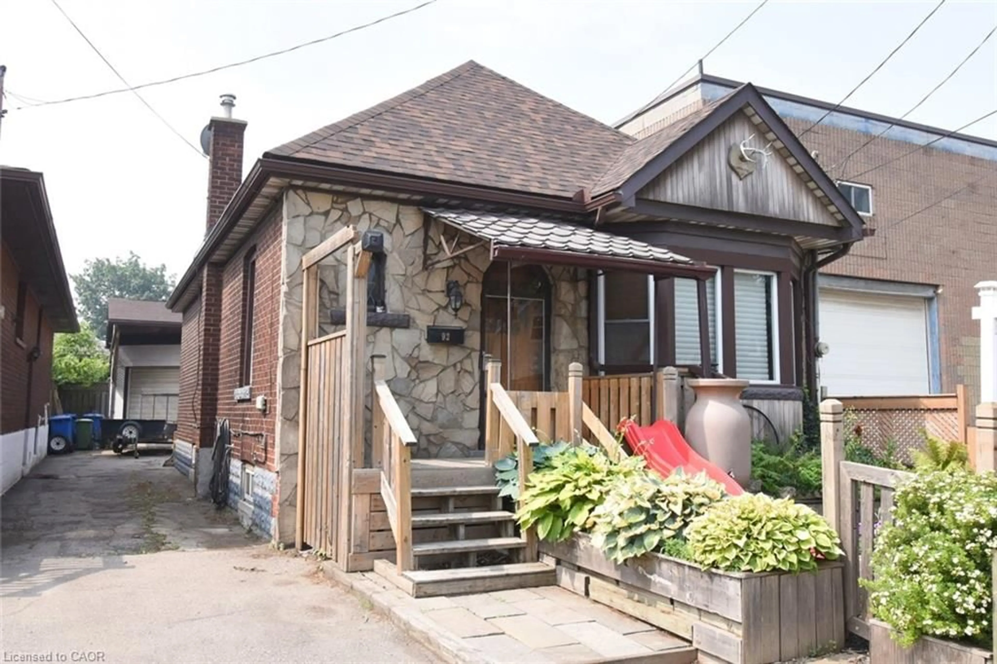 Home with brick exterior material, street for 92 Gertrude St, Hamilton Ontario L8L 4C2