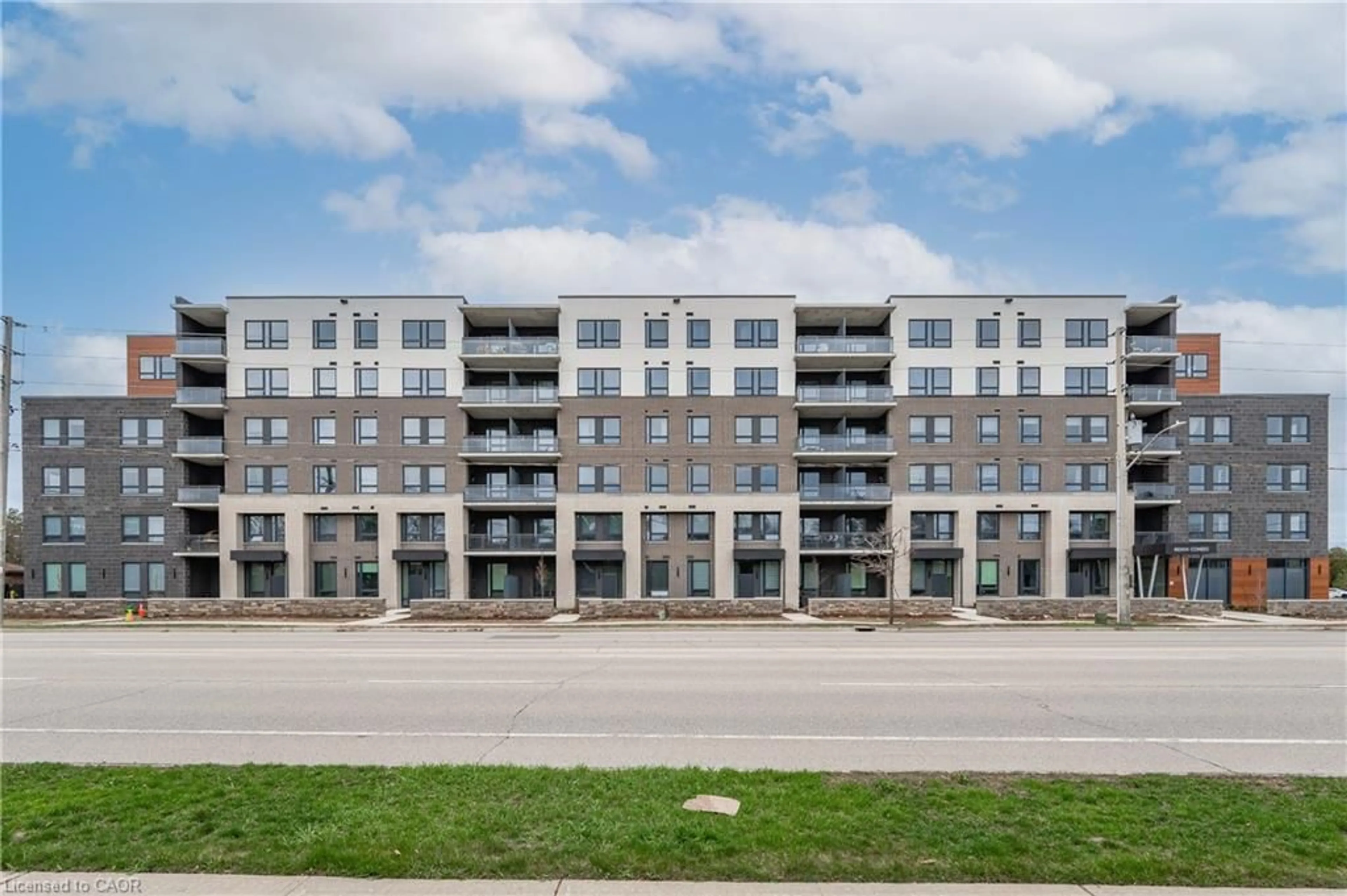 A pic from outside/outdoor area/front of a property/back of a property/a pic from drone, building for 26 Lowes Rd #207, Guelph Ontario N1G 4X2