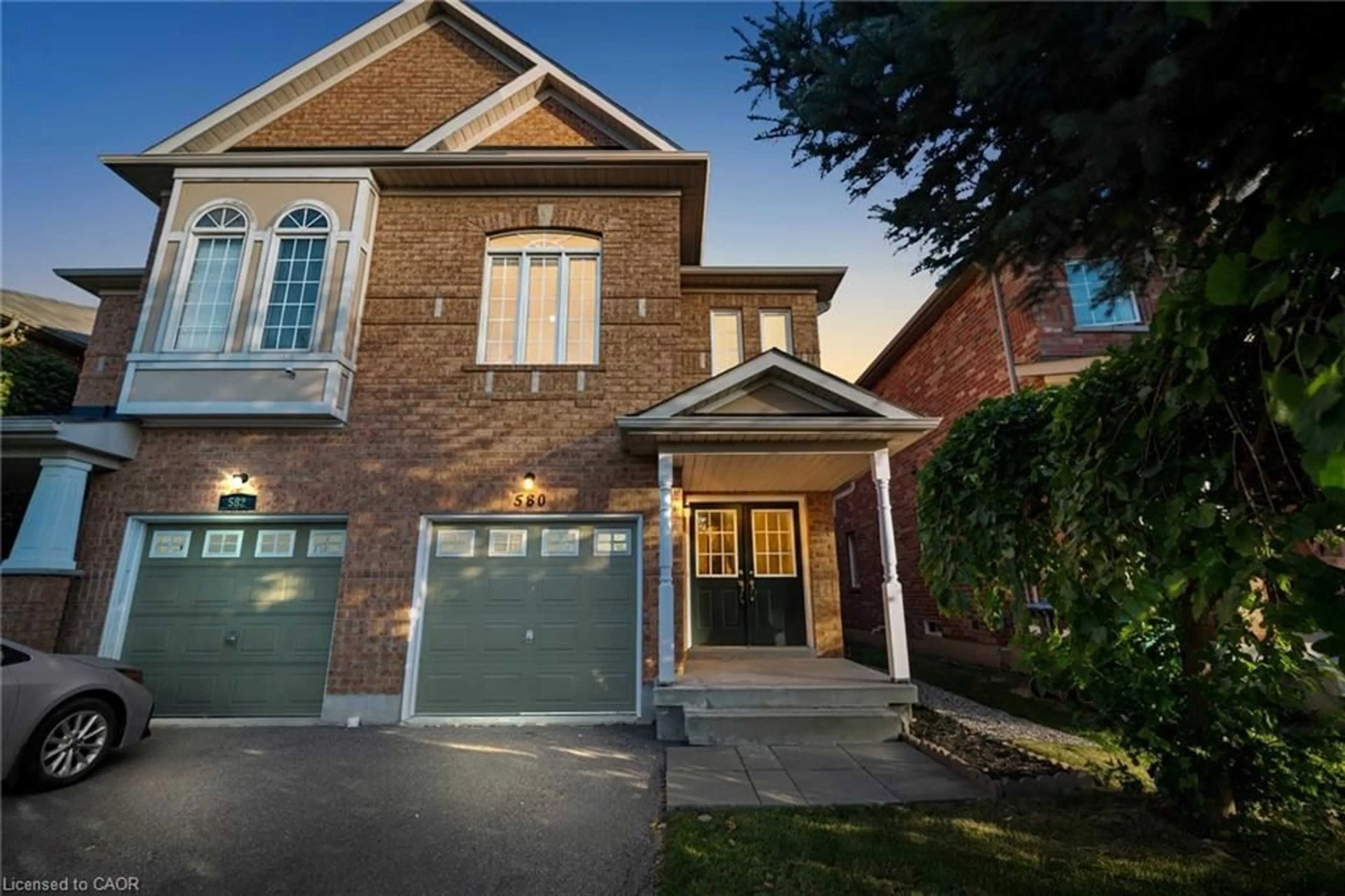 Home with brick exterior material, street for 580 Courtney Valley Rd, Mississauga Ontario L5V 0C2