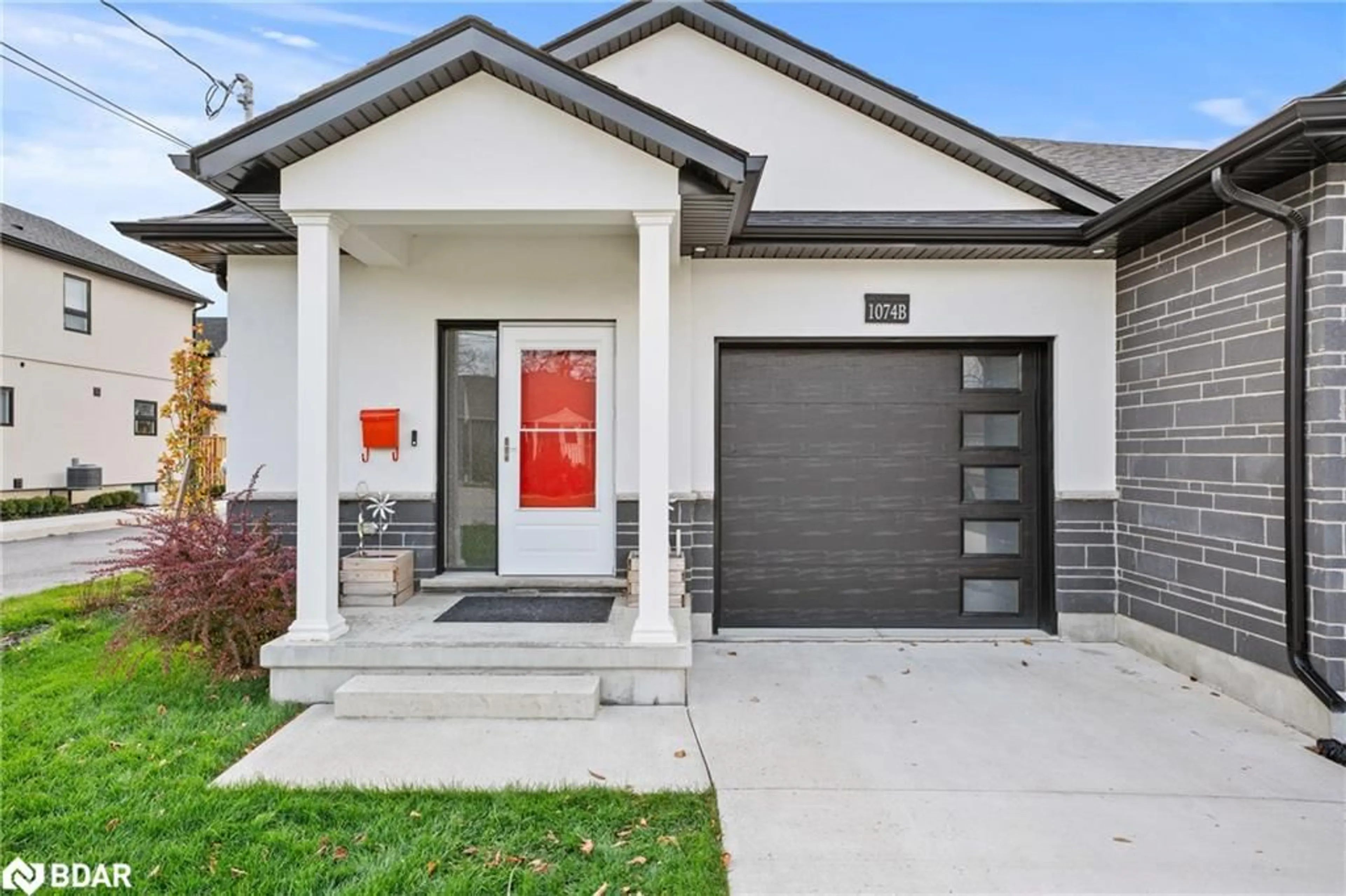 Home with brick exterior material, street for 1074B Vansickle Rd, St. Catharines Ontario L2S 2X3