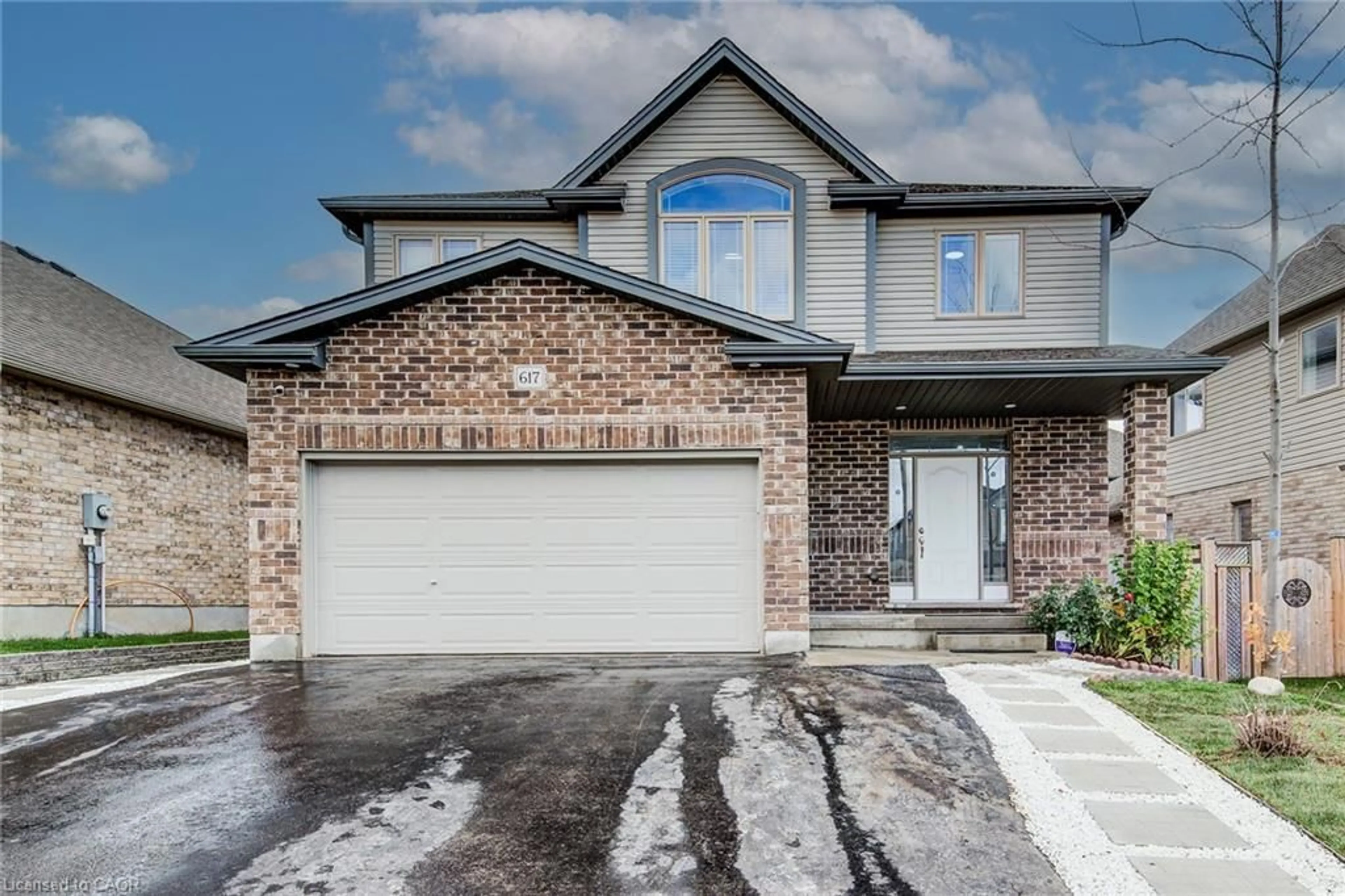 Home with brick exterior material, street for 617 Thorndale Dr, Waterloo Ontario N2T 0A9