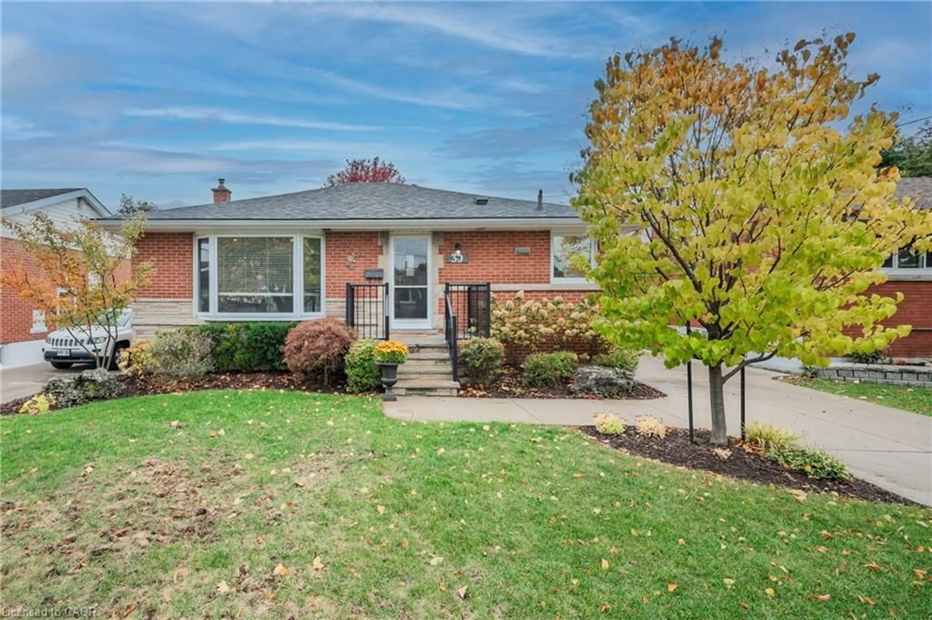 Home with brick exterior material, street for 30 Wildewood Ave, Hamilton Ontario L8T 1X3