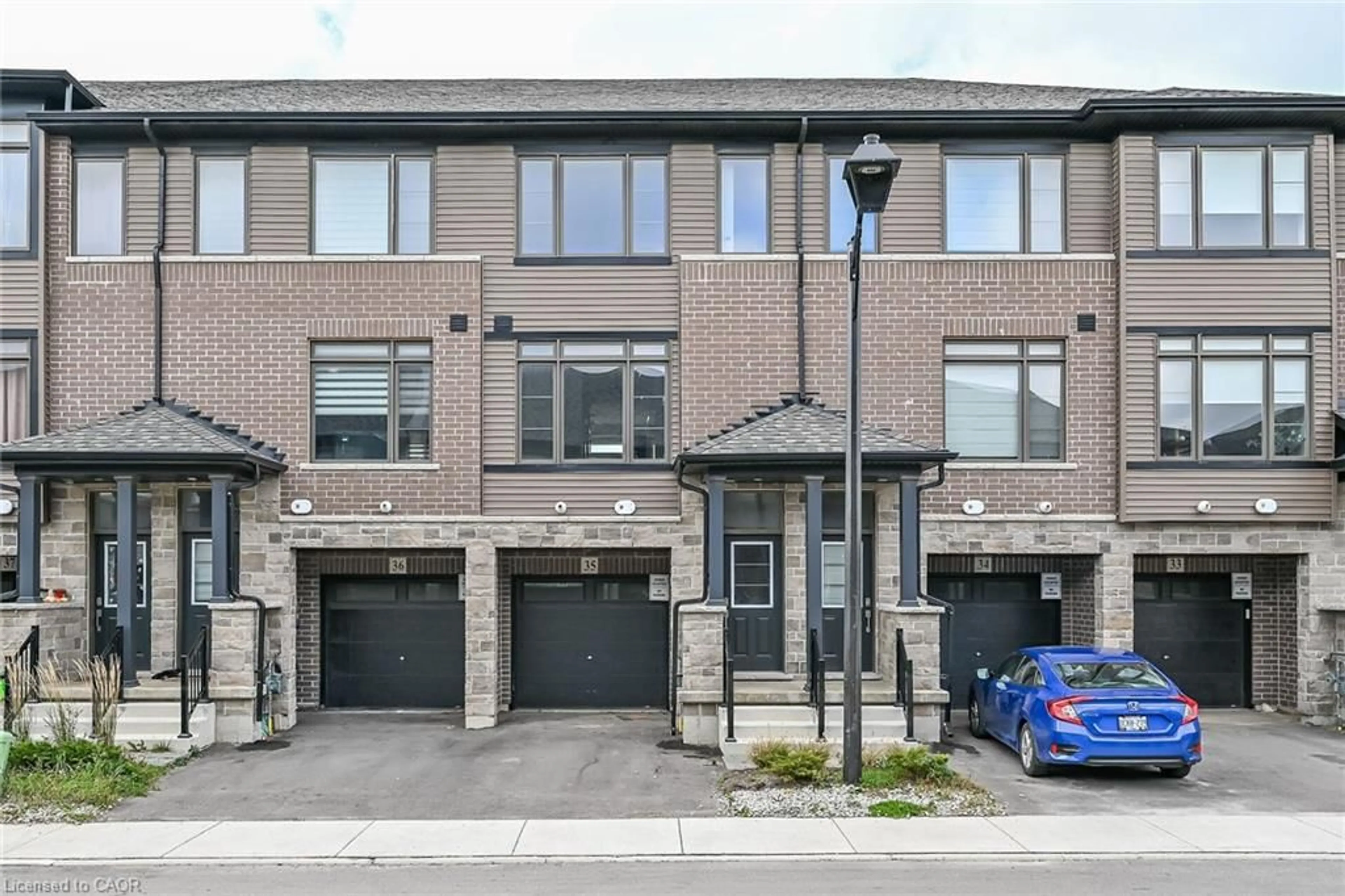 Home with brick exterior material, street for 120 Court Dr #35, Paris Ontario N3L 0N2