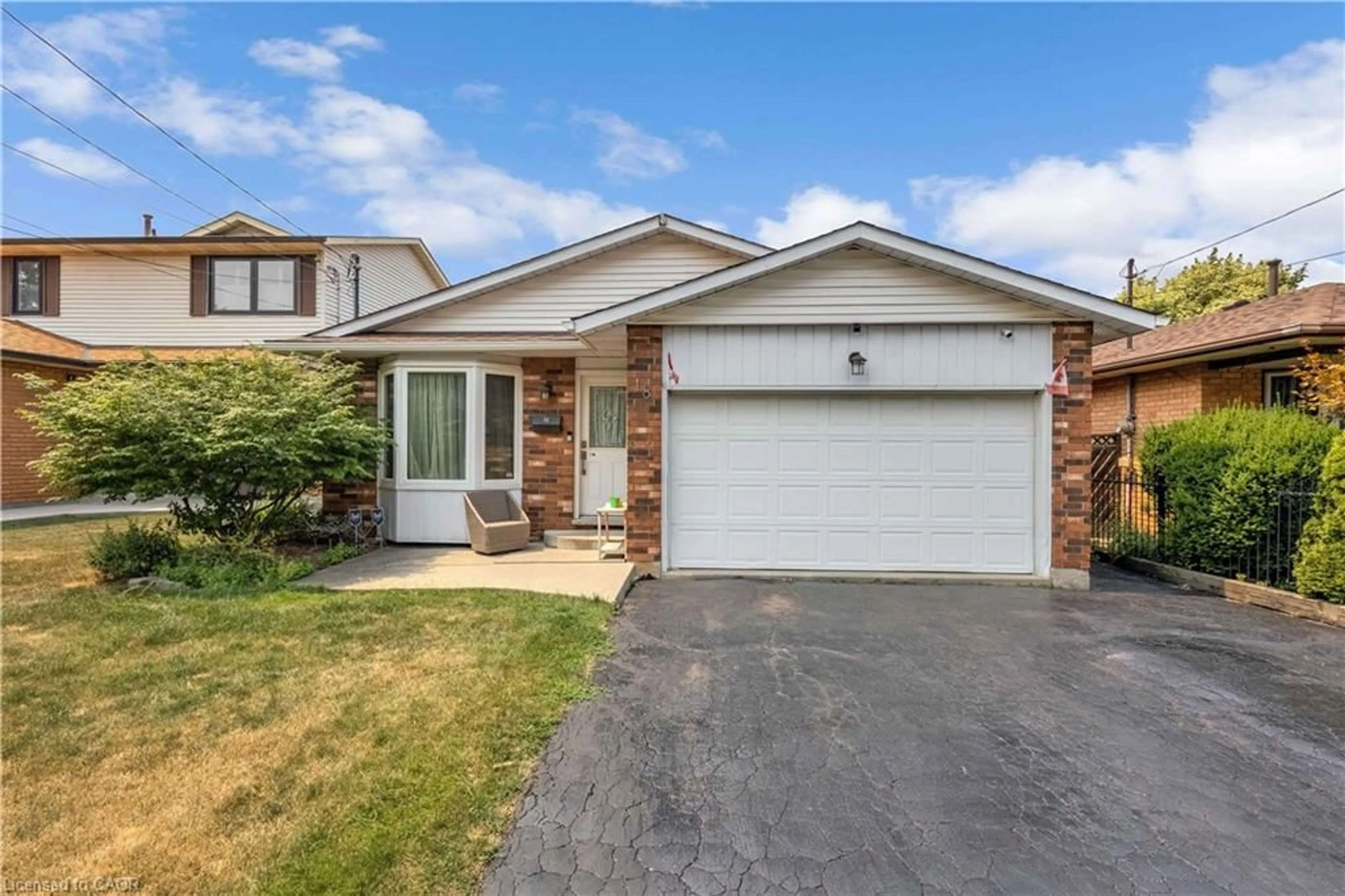 Home with brick exterior material, street for 18 Rosewell St, Hamilton Ontario L8W 2L1