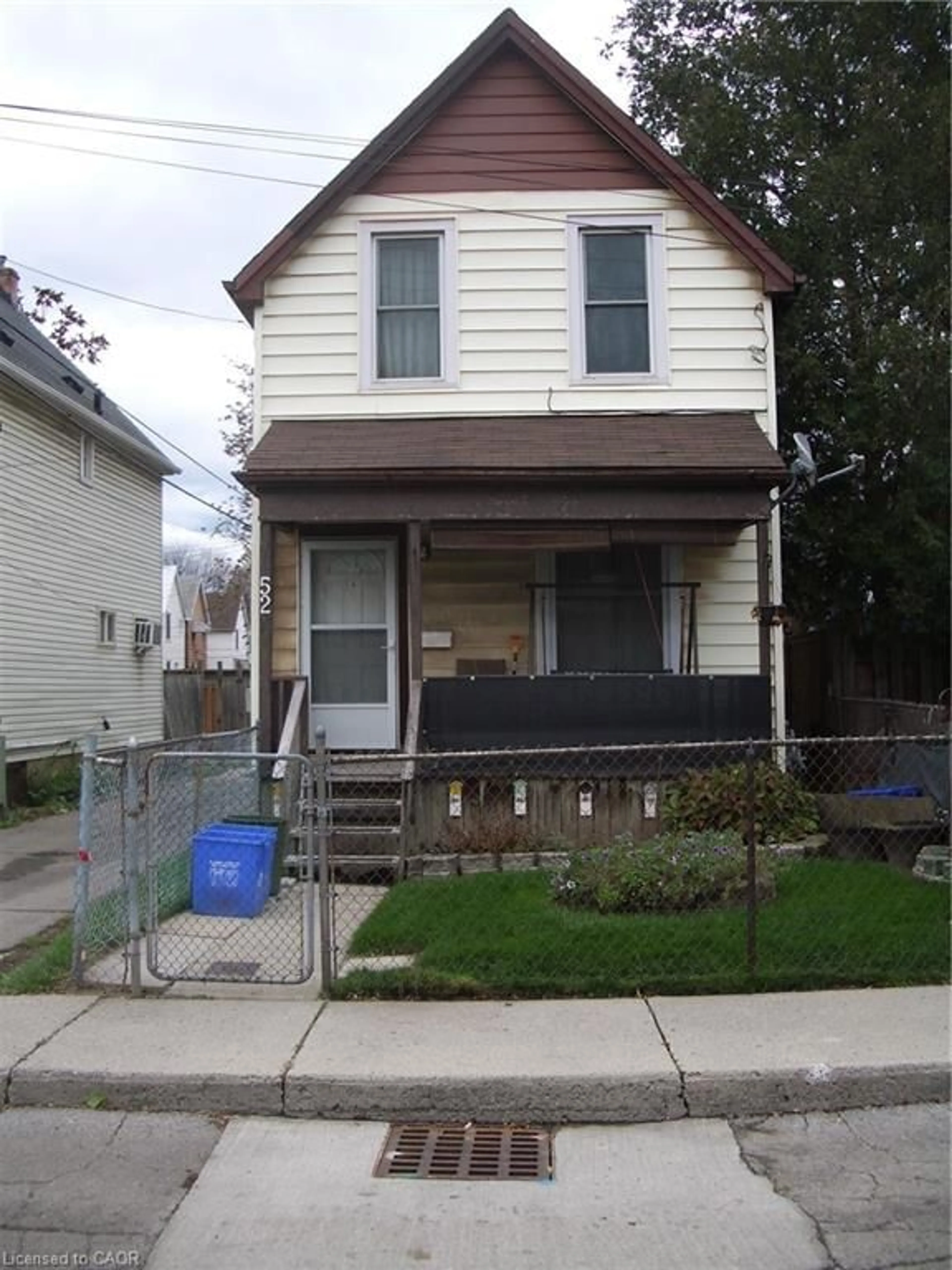Home with vinyl exterior material, street for 52 Douglas Ave, Hamilton Ontario L8L 5R3