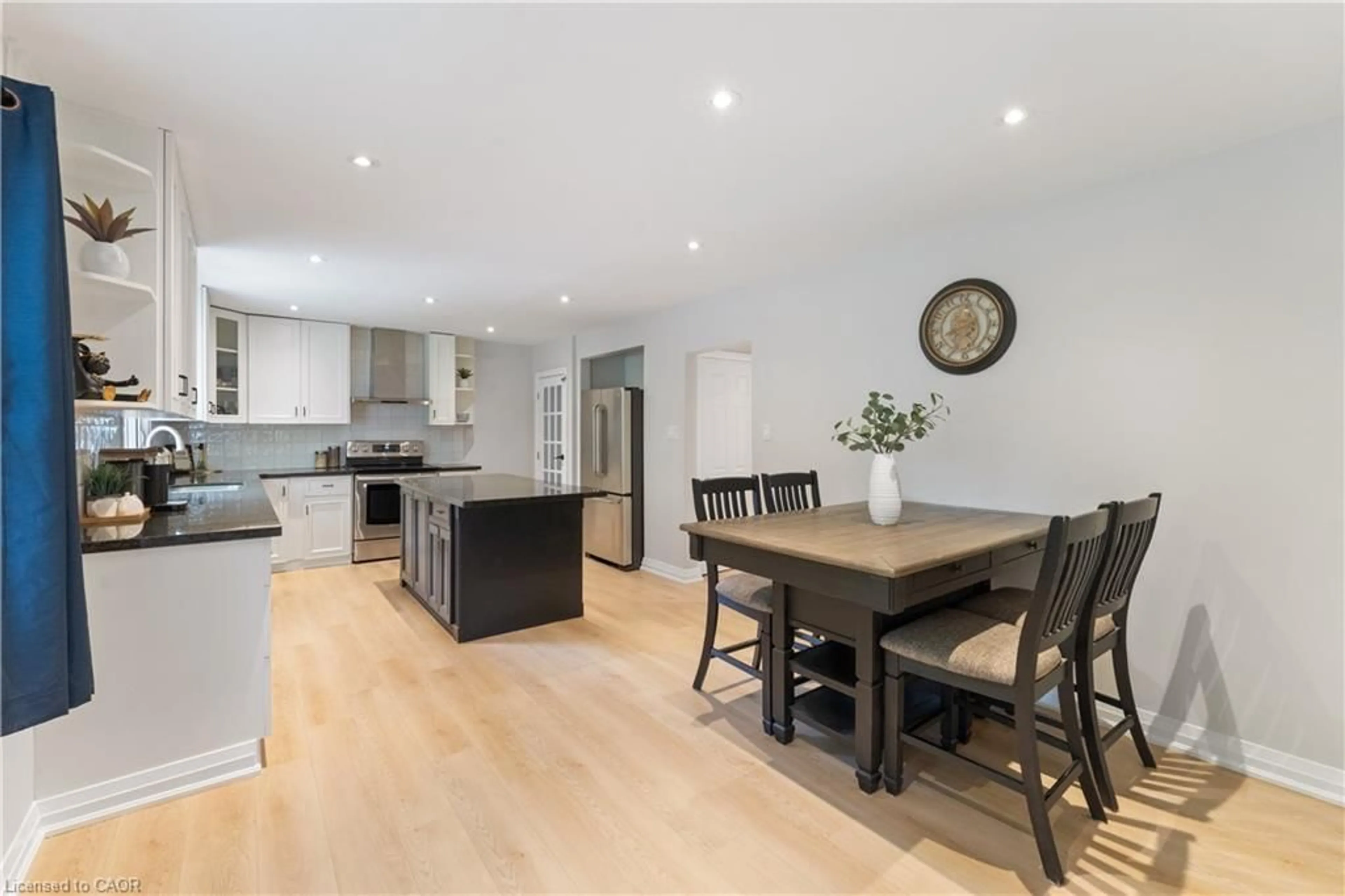 Open concept kitchen, wood/laminate floor for 136 Mohawk Rd, Ancaster Ontario L9G 2W9