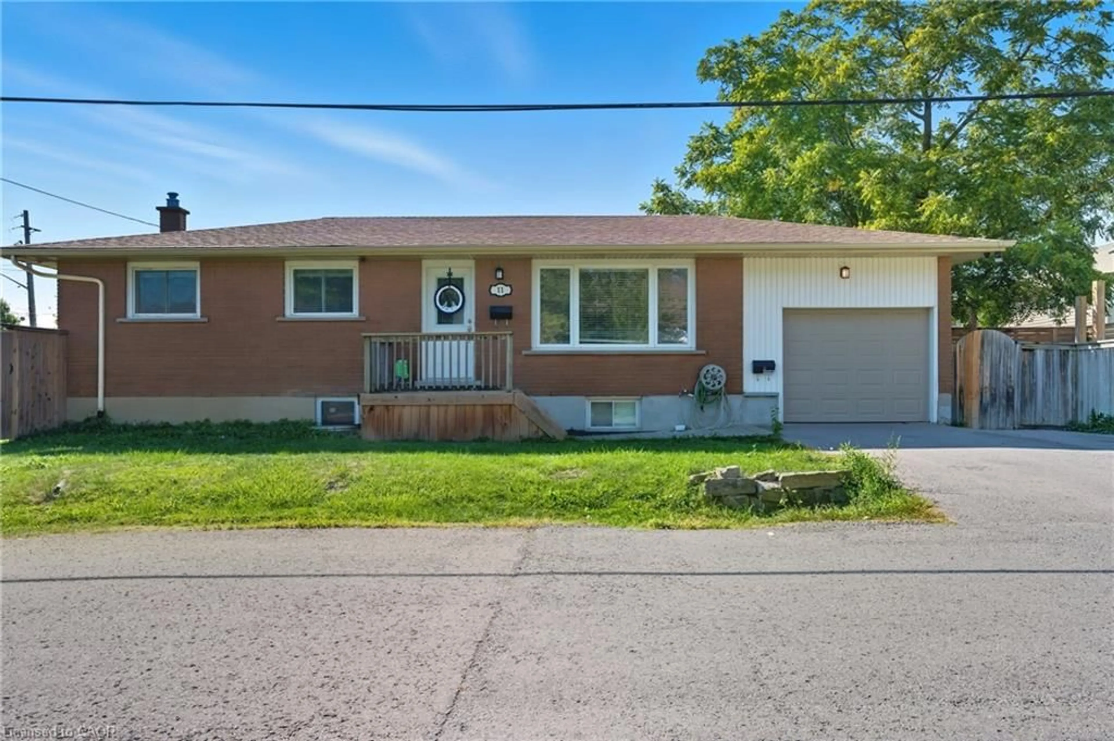 Home with brick exterior material, street for 11 Rockwood Ave, St. Catharines Ontario L2P 1E3