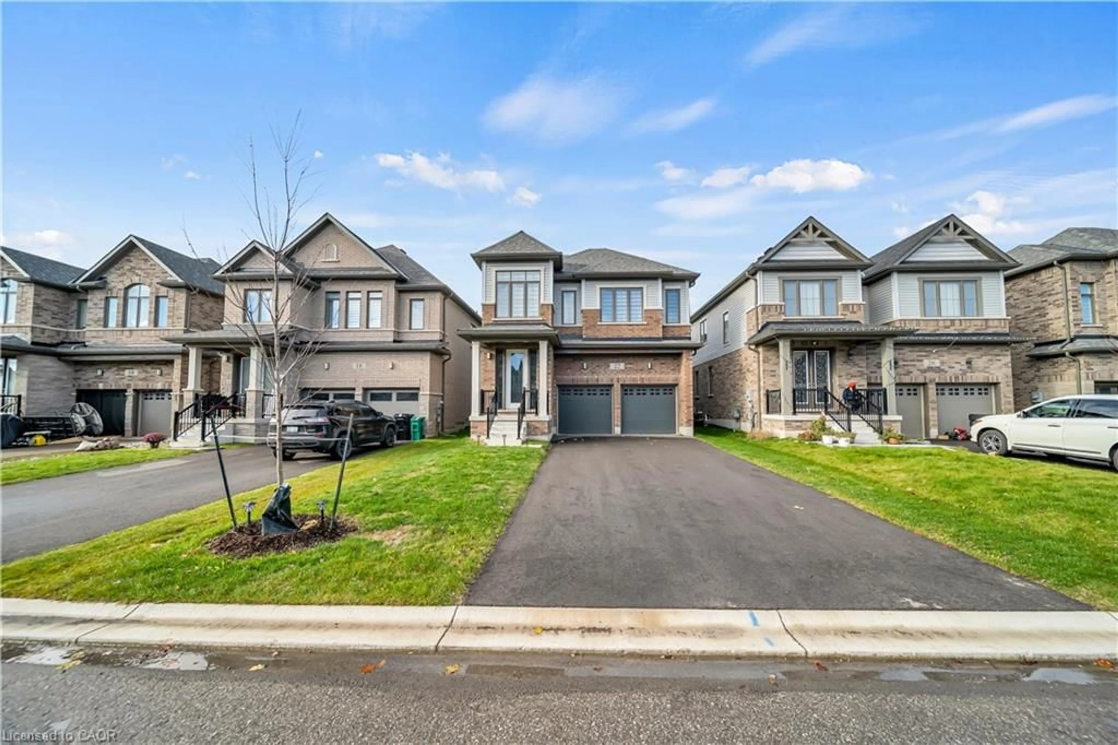 A pic from outside/outdoor area/front of a property/back of a property/a pic from drone, street for 22 Rustic Oak Trail, Ayr Ontario N0B 1E0