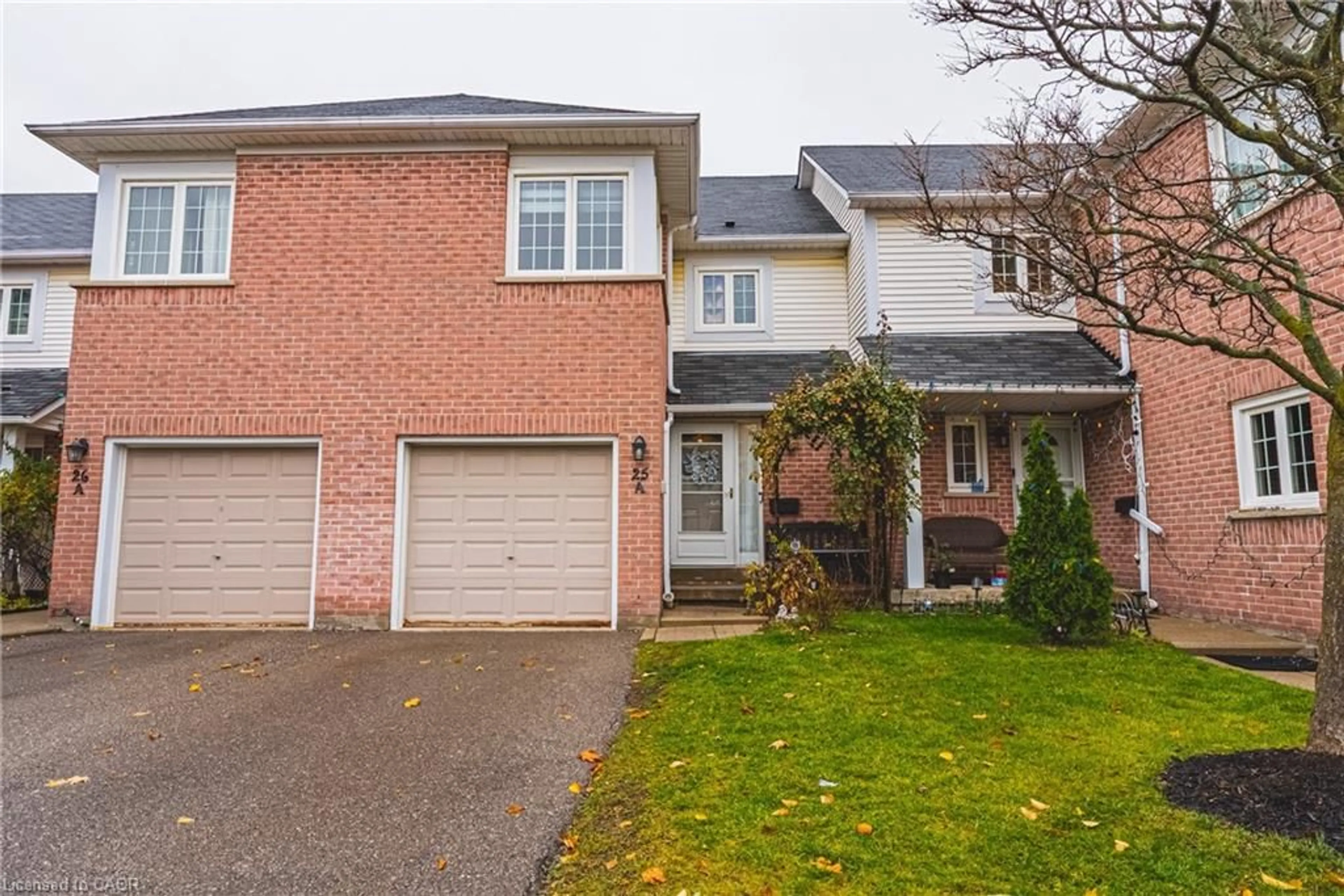 Home with brick exterior material, street for 5205 Glen Erin Dr #25A, Mississauga Ontario L5M 5N6