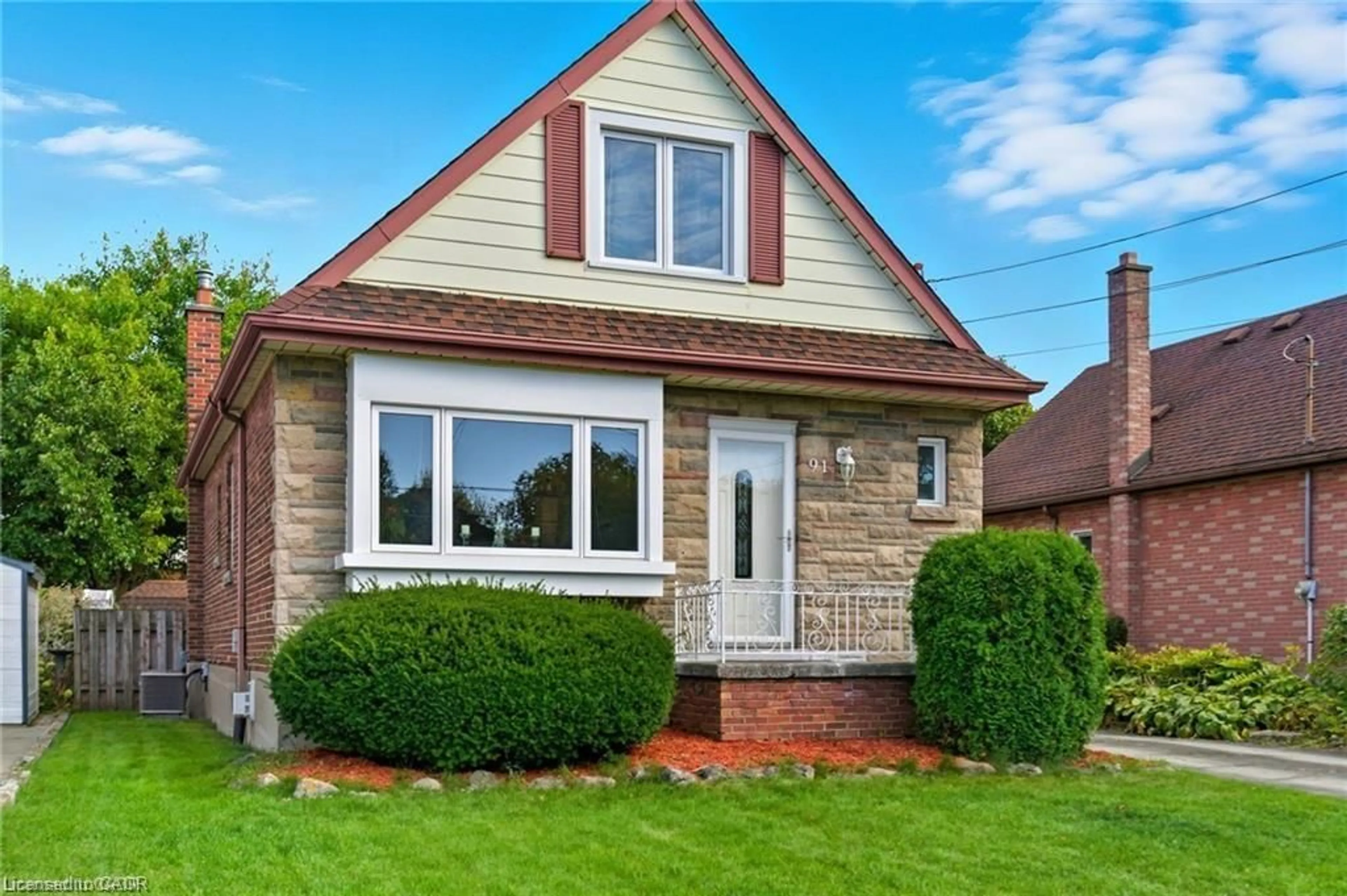 Home with brick exterior material, street for 91 East 42nd St, Hamilton Ontario L8T 3A2