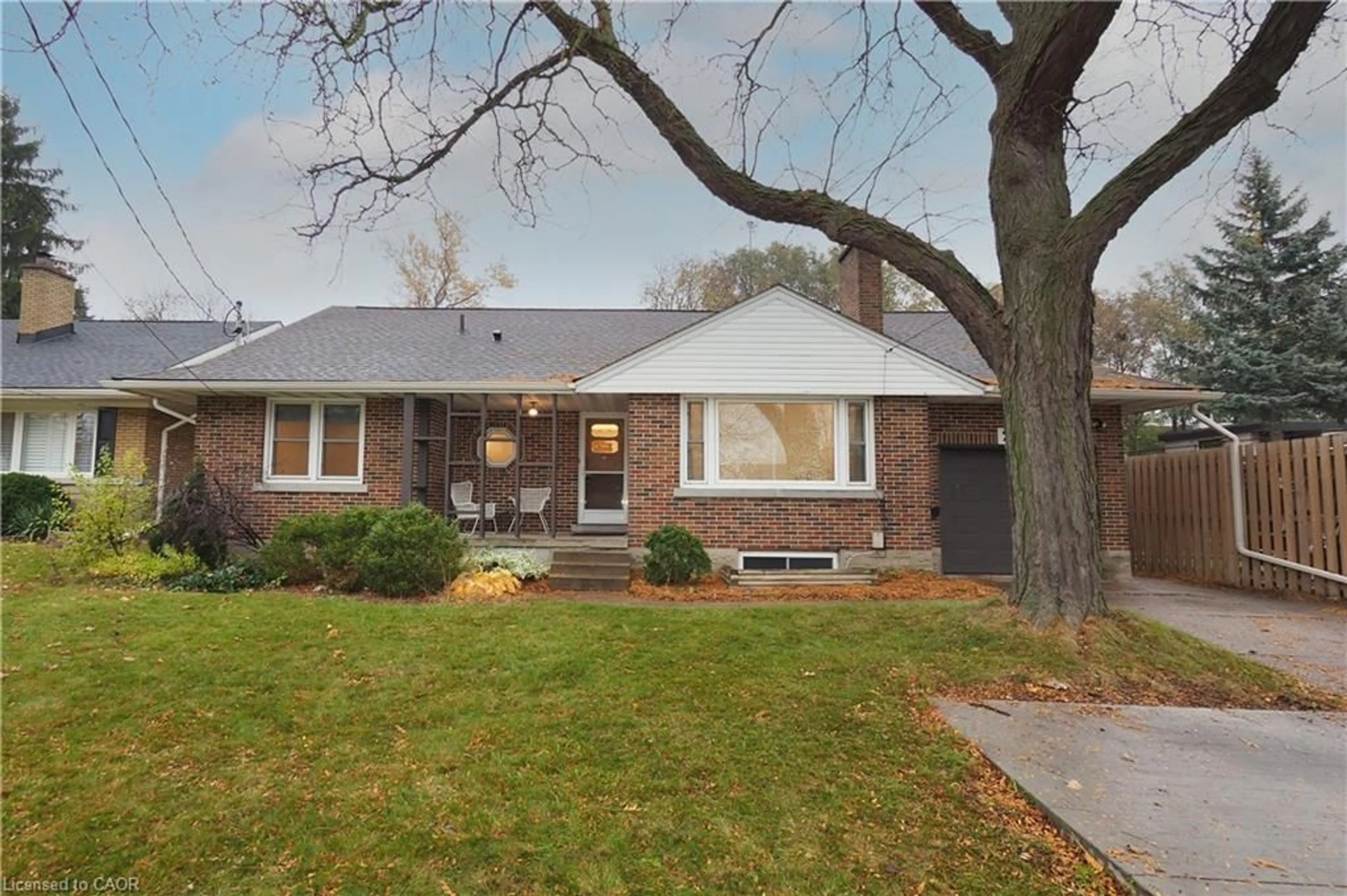 Home with brick exterior material, street for 296 Dumfries Ave, Kitchener Ontario N2H 2E8